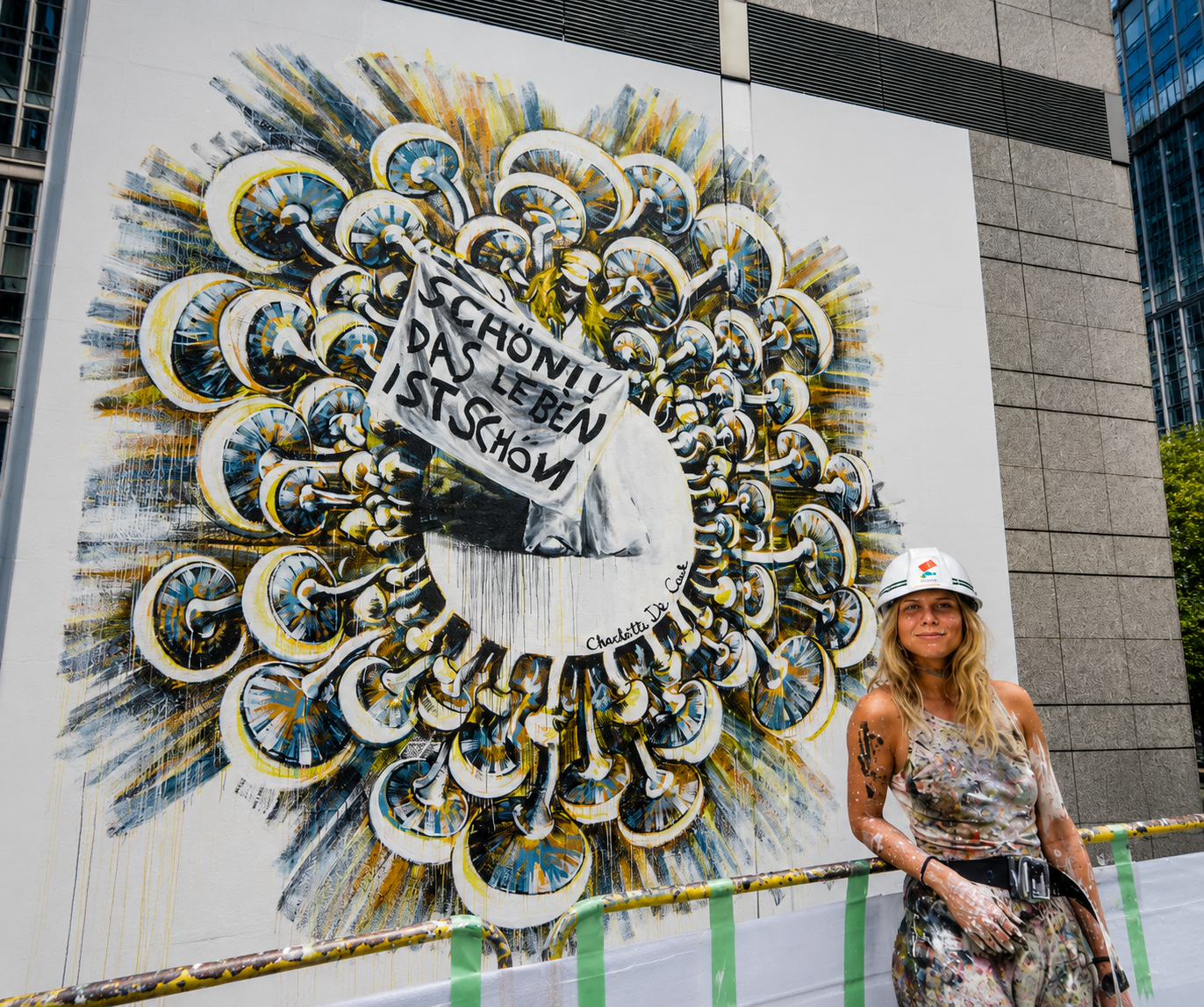 Portrait of Antwerp-based artist Charlotte De Cock, who designed the WAVE logo.