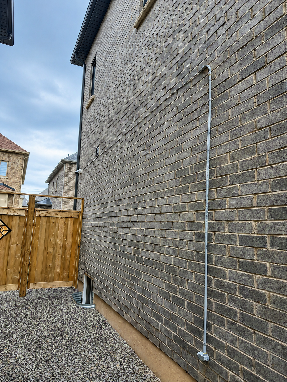 Clean wire routing for backyard camera in Oakville by SKJ Home Solutions