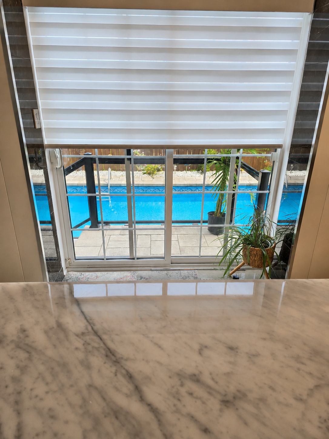 Zebra Blinds in Backyard Door in Burlington by SKJ Home Solutions