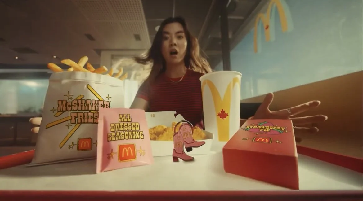 Photo still of Candyce Ha in McDonald's "All Dressed Up" commercial broadcast in Canada featuring Shania Twain.