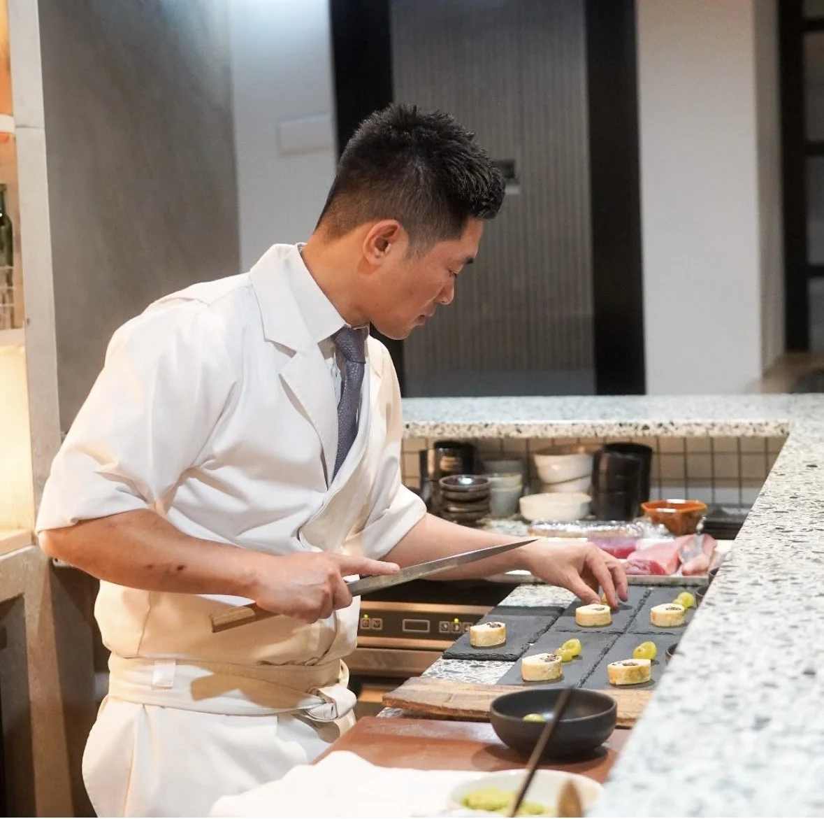 Chef Yohei from Ibuki Komeya  preparing sushi