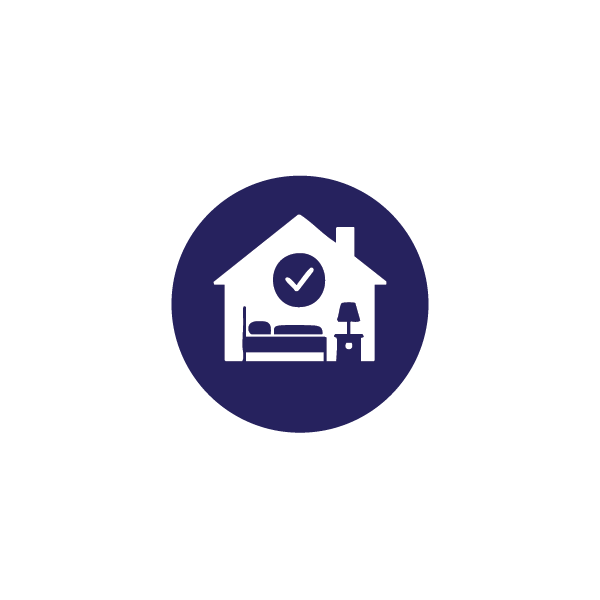 Icon of a house with a bed, lamp, and a checkmark inside a circle, symbolizing home approval or checklist.