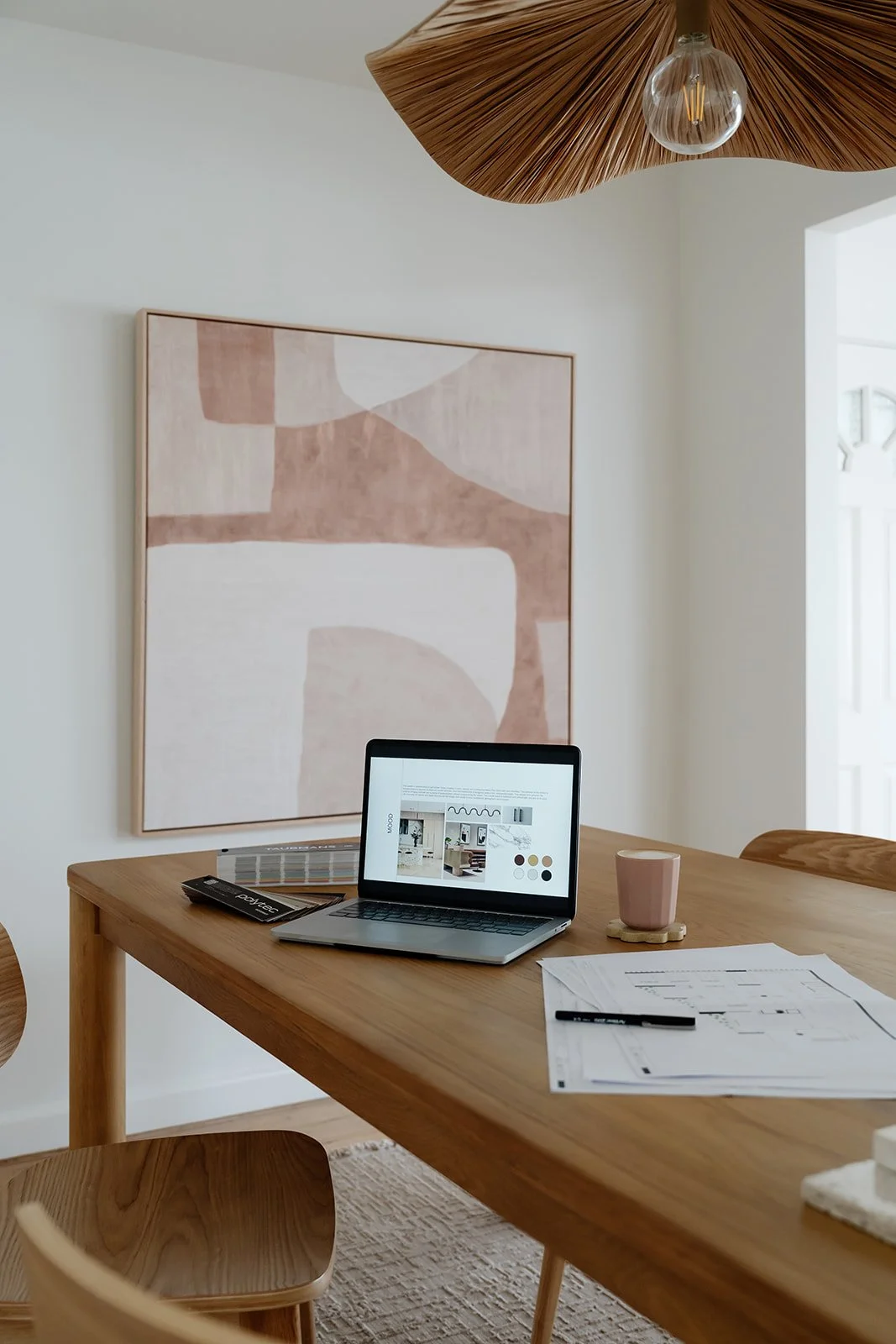 Interior Design studio desk with samples and laptop