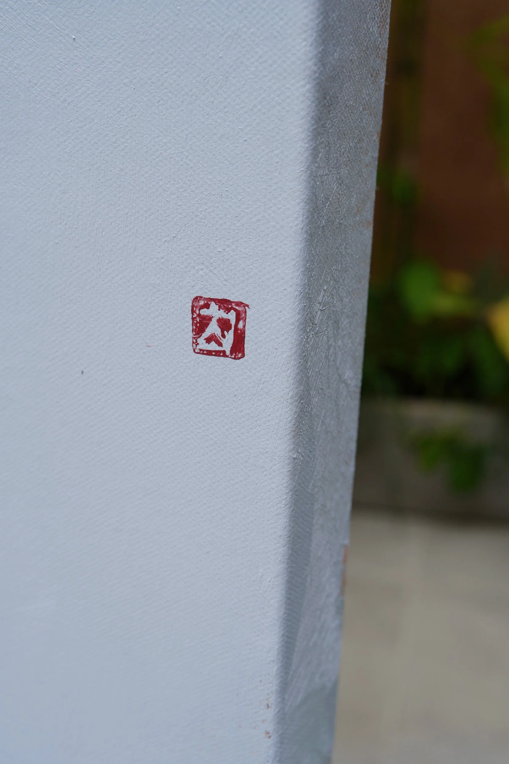 Moran – the artist's red seal signature on the front of the linen canvas