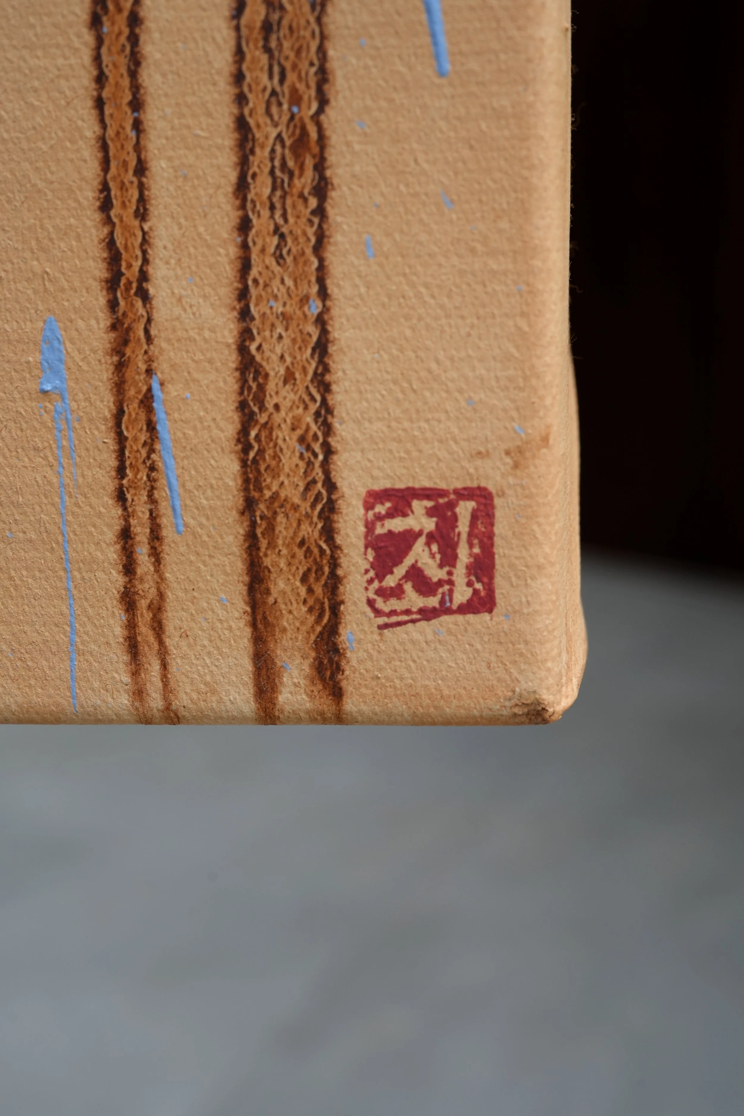 Formation – the artist's red seal on the raw linen edge with ochre drips