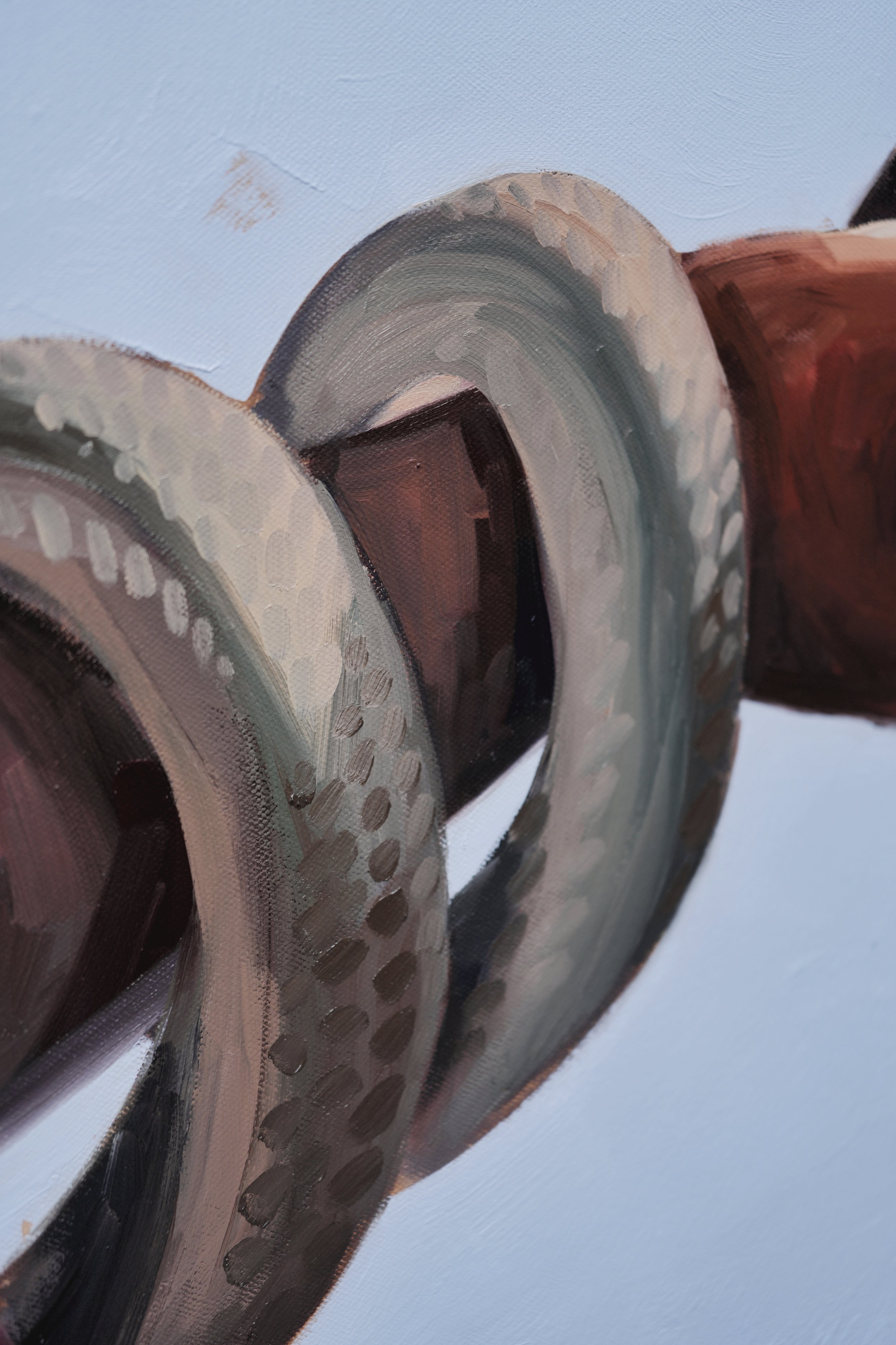 Detail of thick grey snake coils wrapped tightly around a bare forearm, oil on linen, Sagwa by Marina Ogai