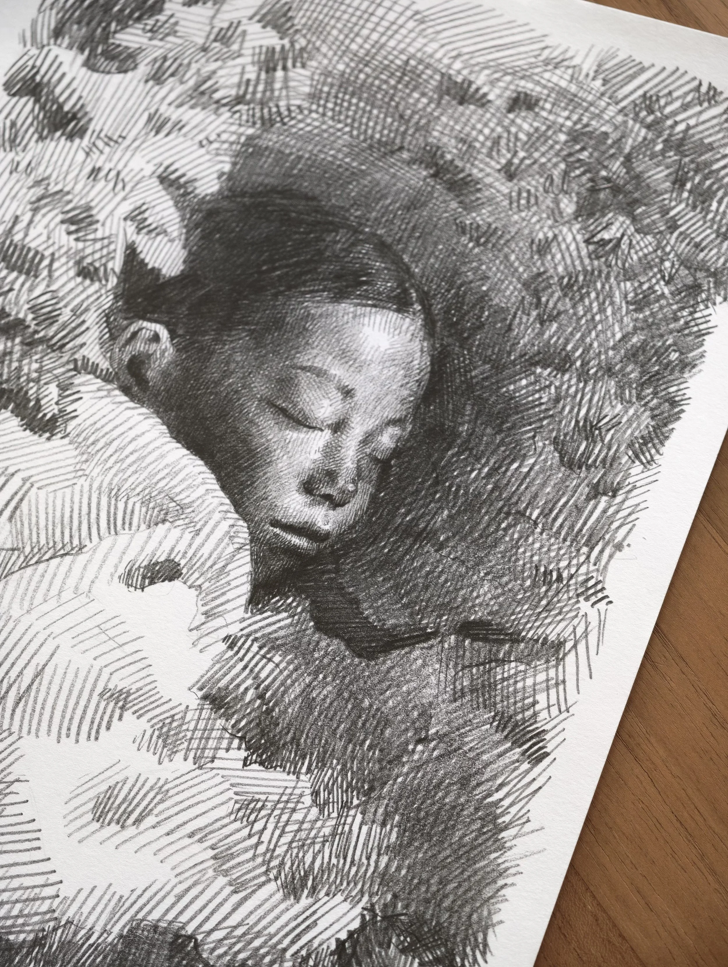 Pencil drawing of a woman with eyes closed resting her head on her hand, by Marina Ogai