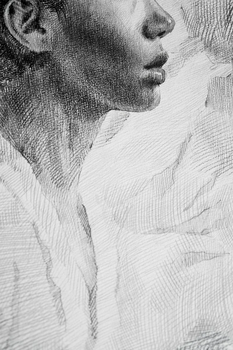 A young woman's profile in motion with a second faint profile behind her, dense pencil hatching, from The In-Between by Marina Ogai