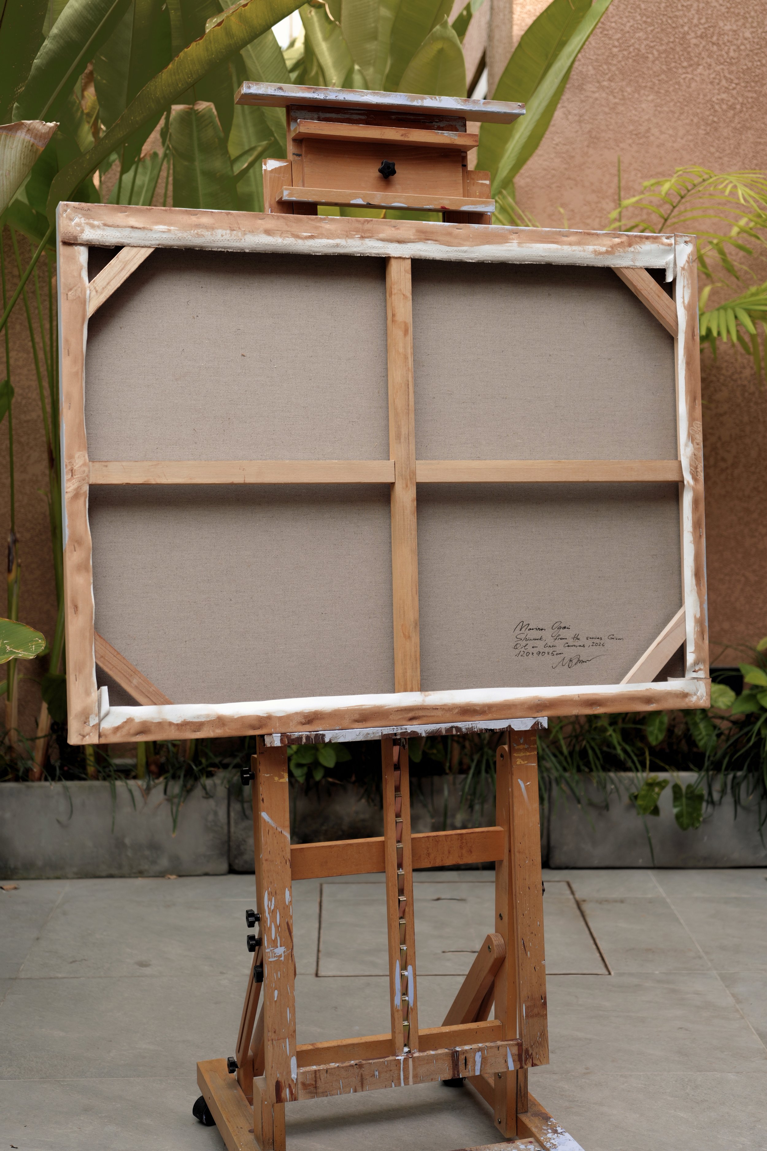 Back of the stretched linen canvas with the handwritten title and signature, Shinmok by Marina Ogai