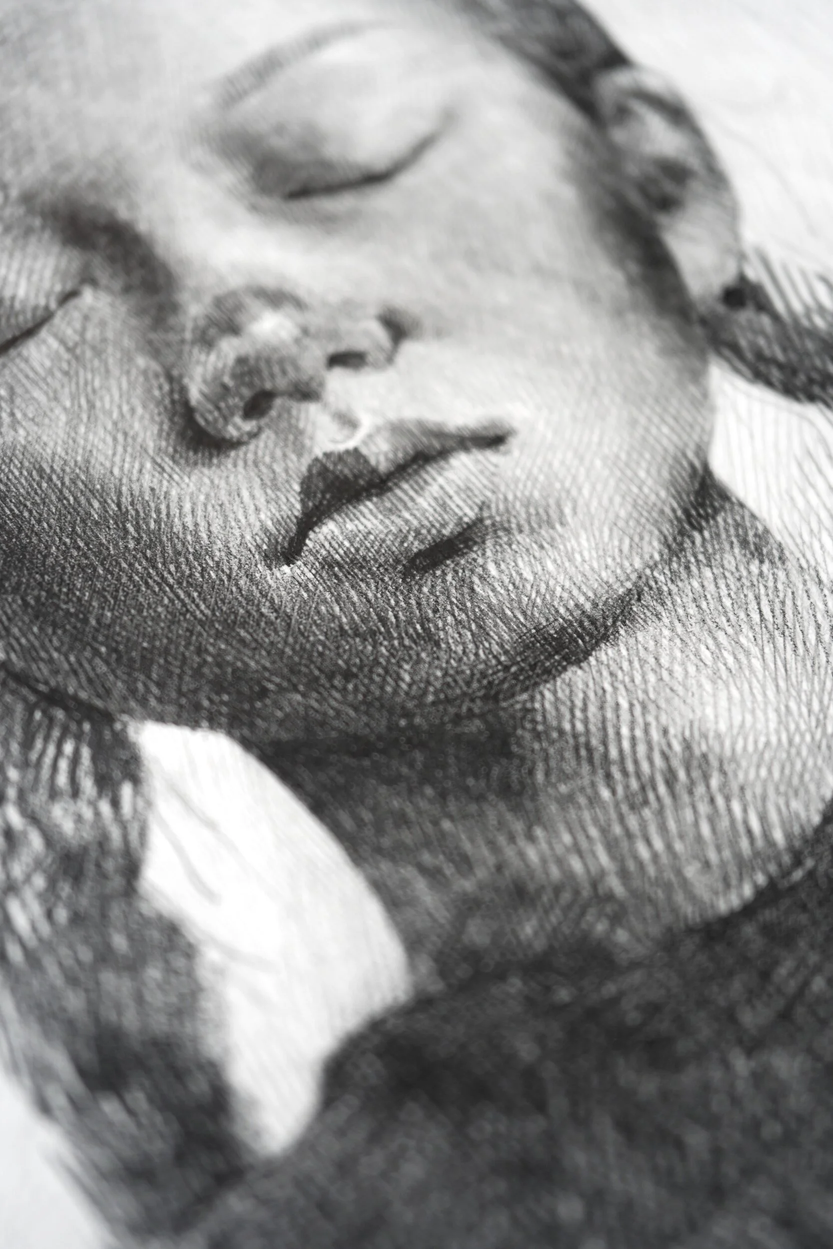 Detail of Return by Marina Ogai: close-up of the girl's closed eyes, nose and lips in dense pencil hatching