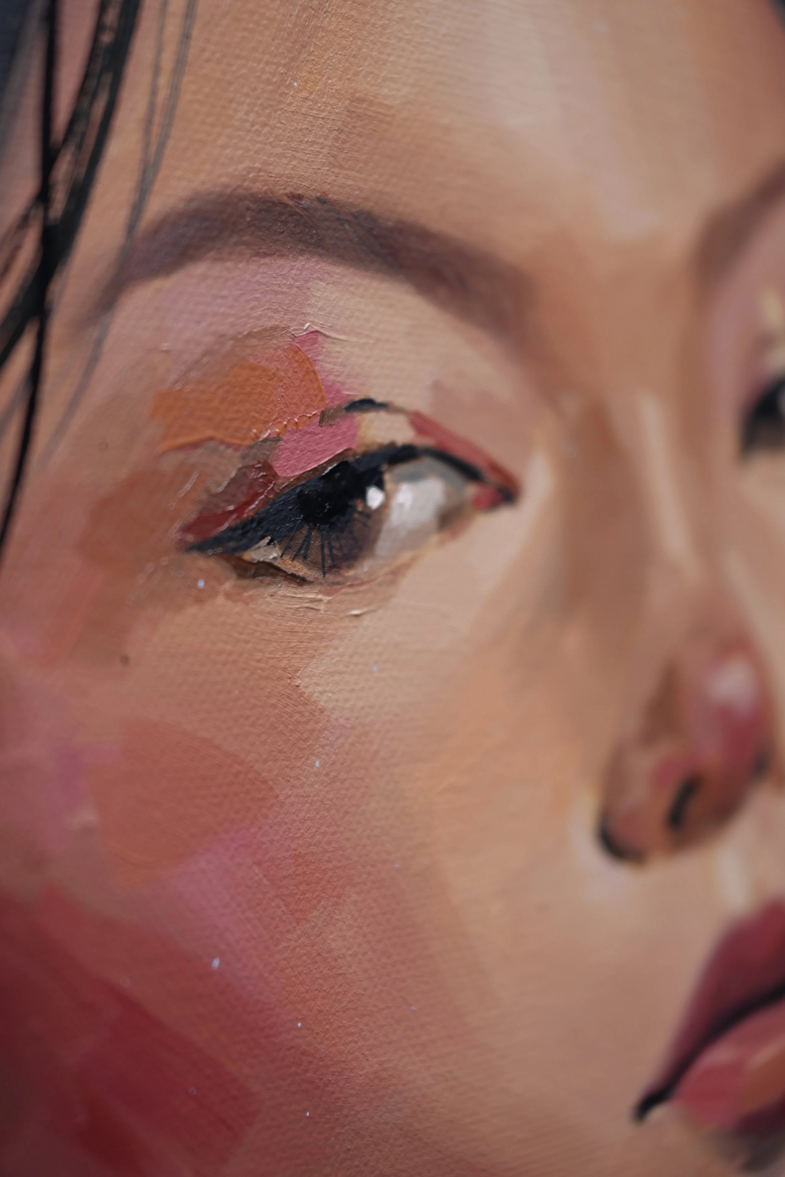 Close-up of the girl's eye and cheek in layered oil strokes – detail of The Aftermath by Marina Ogai
