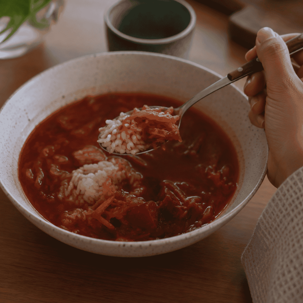 A bowl of borscht with rice, the Soviet-Korean dish, illustrated by Marina Ogai