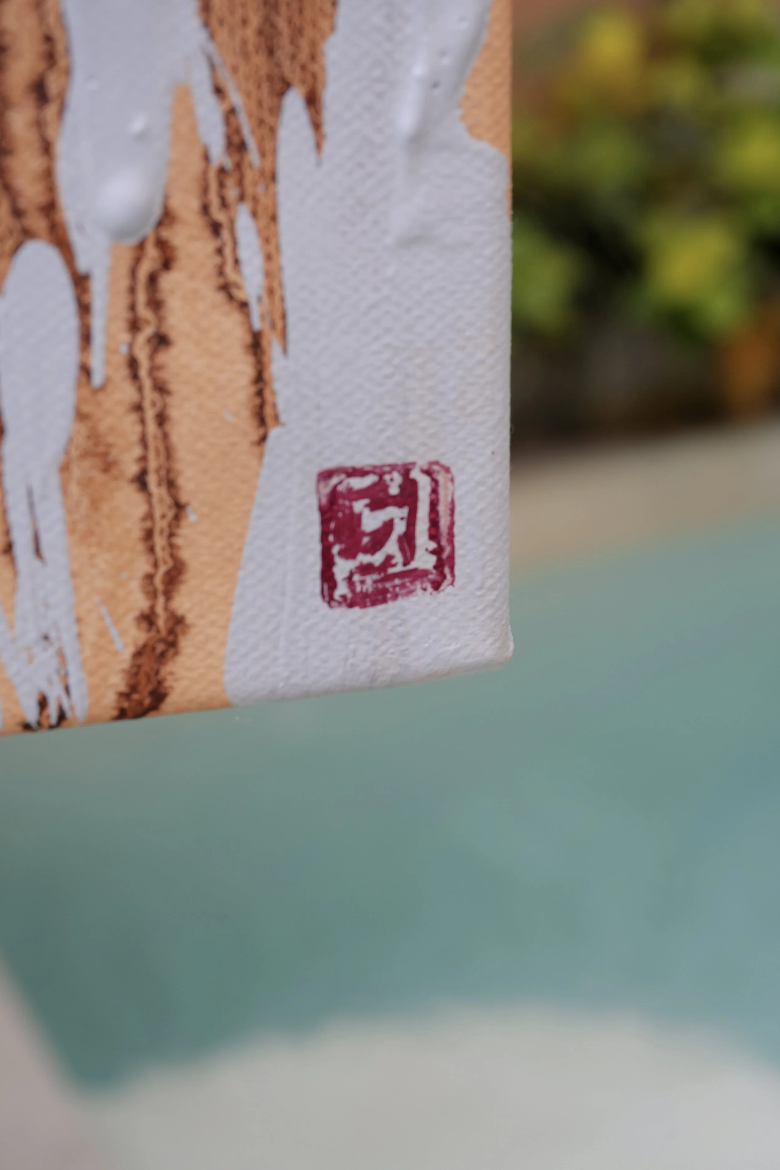 Red seal signature in the lower corner over peeled white paint, detail of Jeopgi by Marina Ogai