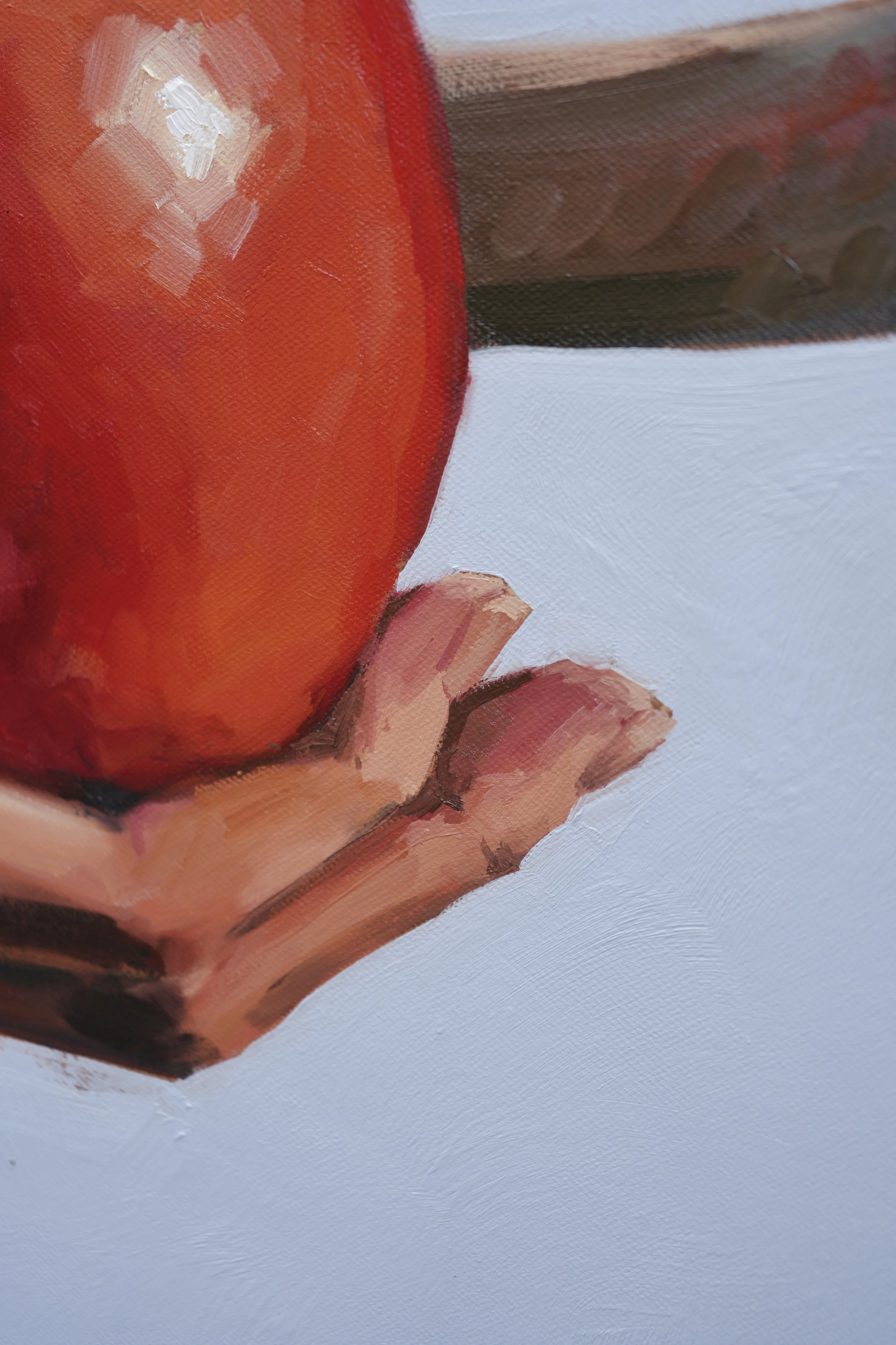 Detail of a cupped palm under the red apple against a pale blue ground, oil on linen, Sagwa by Marina Ogai