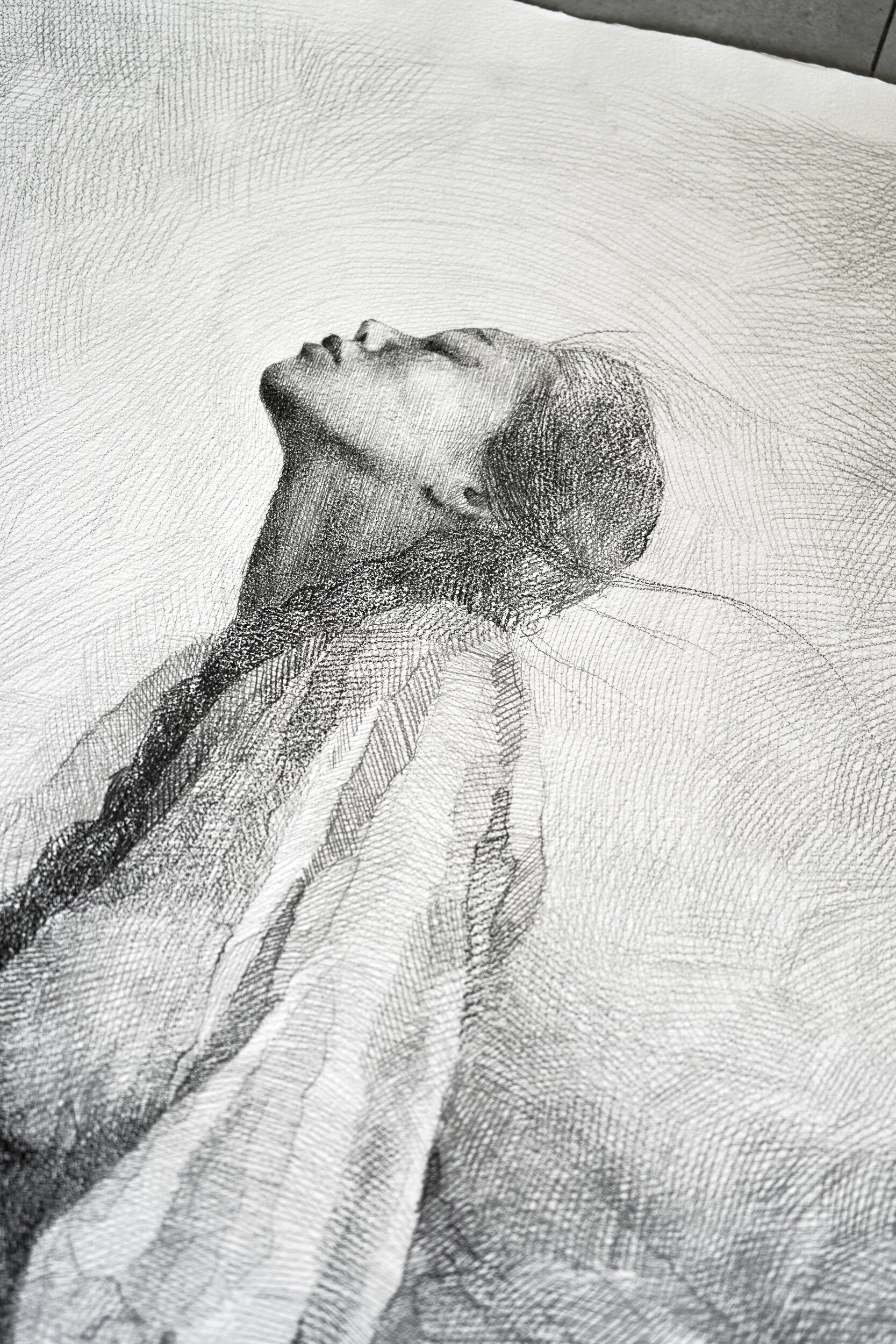 Detail of Fullness by Marina Ogai: head and shoulders tilted back, drapery falling, pencil on paper
