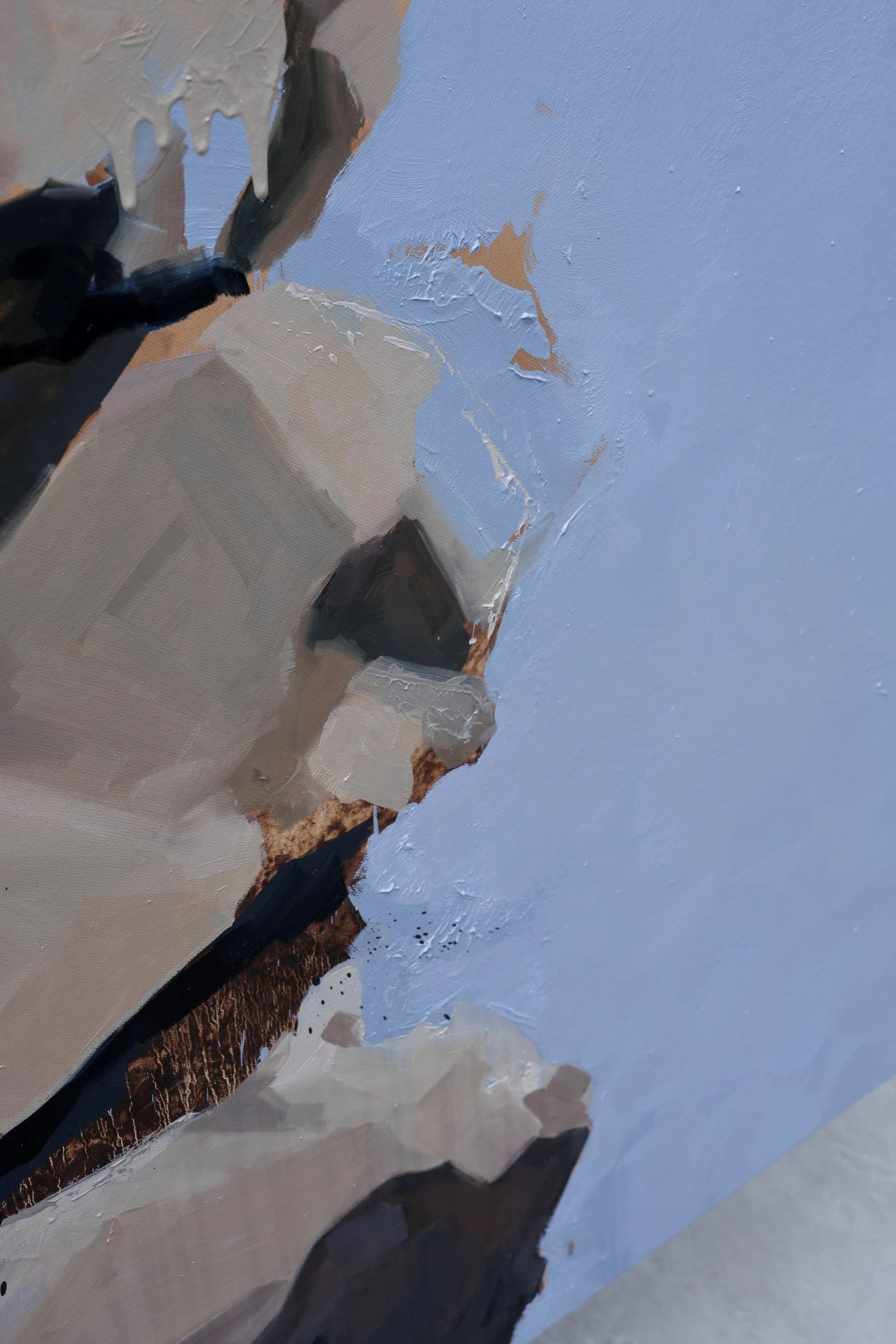 Cairn, detail – the lower stones of the stack dissolving into the blue ground