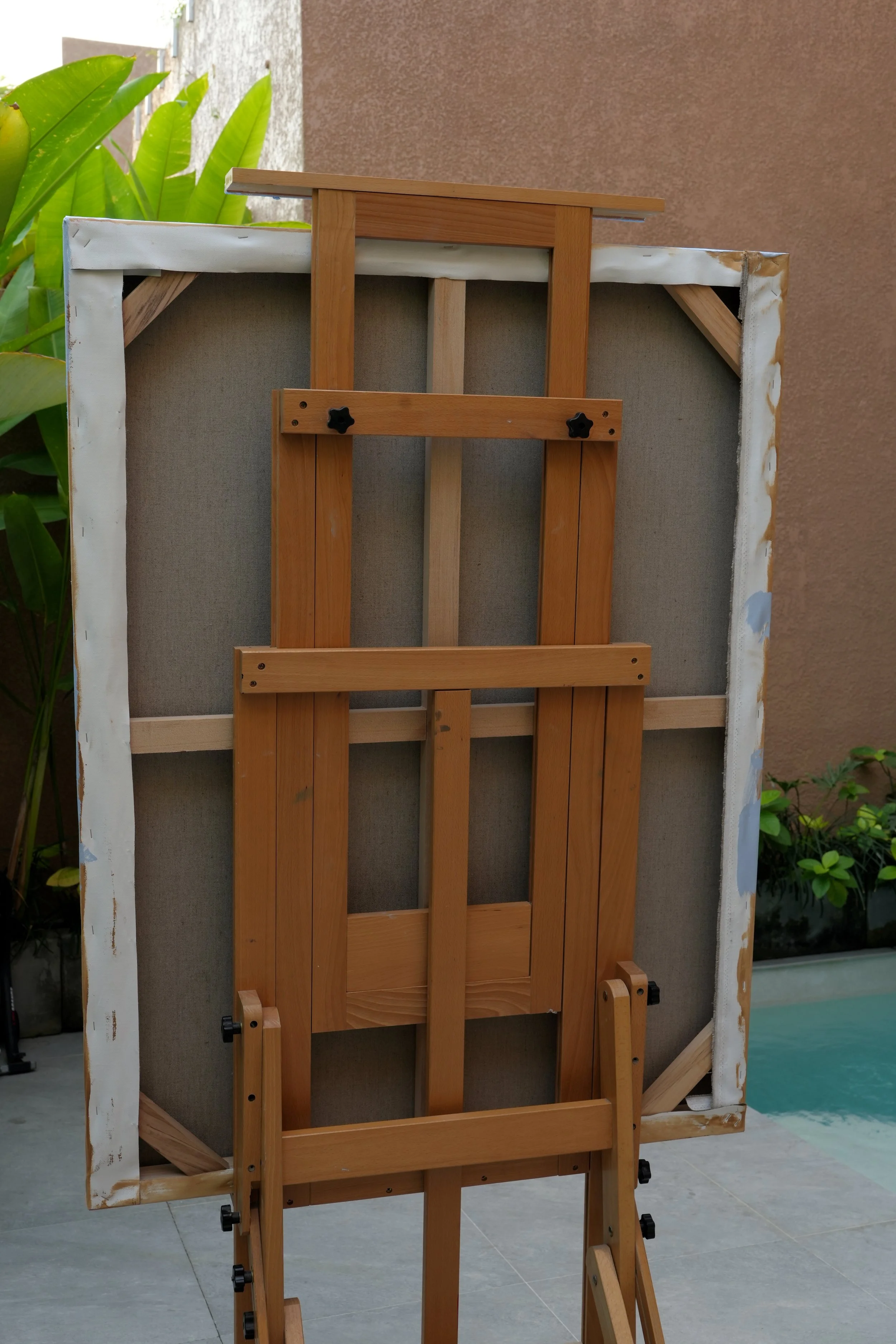 Reverse of the stretched linen canvas showing the wooden stretcher bars, painting by Marina Ogai