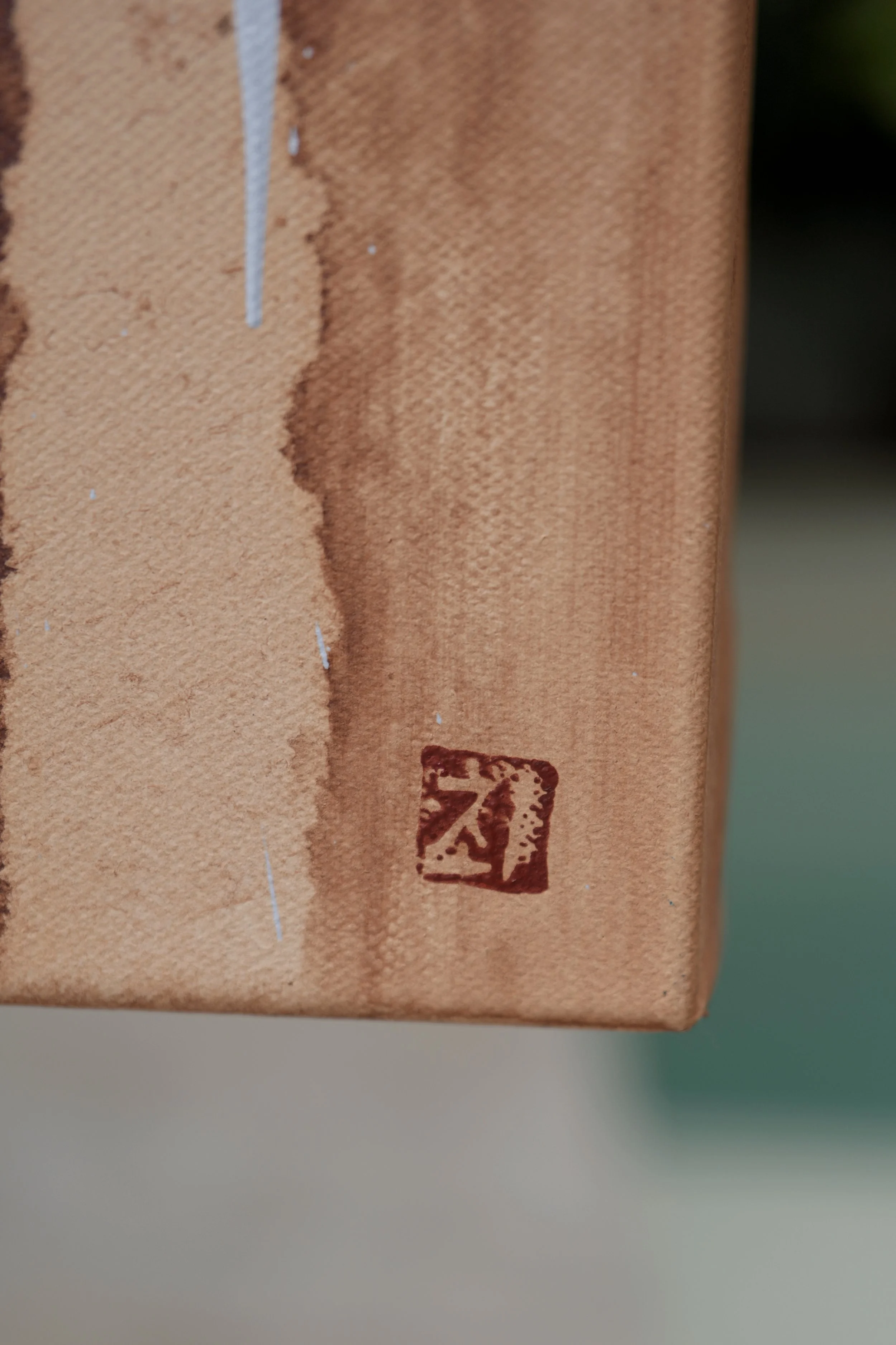 Close-up of the red seal stamp on the canvas edge of Horangi, original oil on linen by Marina Ogai