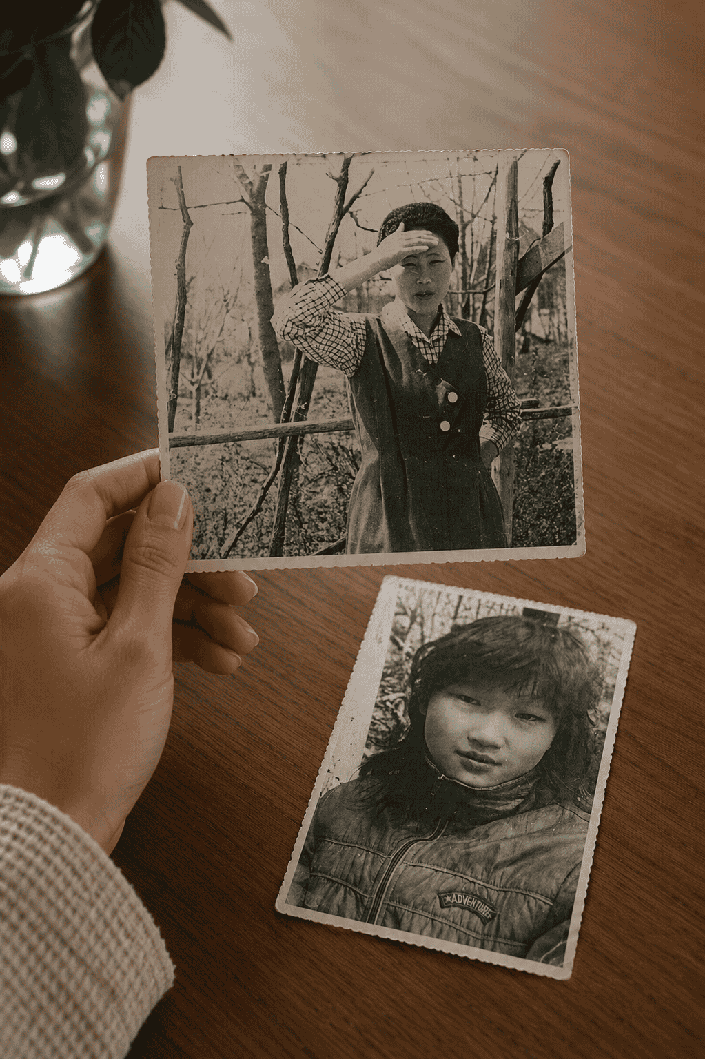 An old black-and-white group photograph of a Korean family