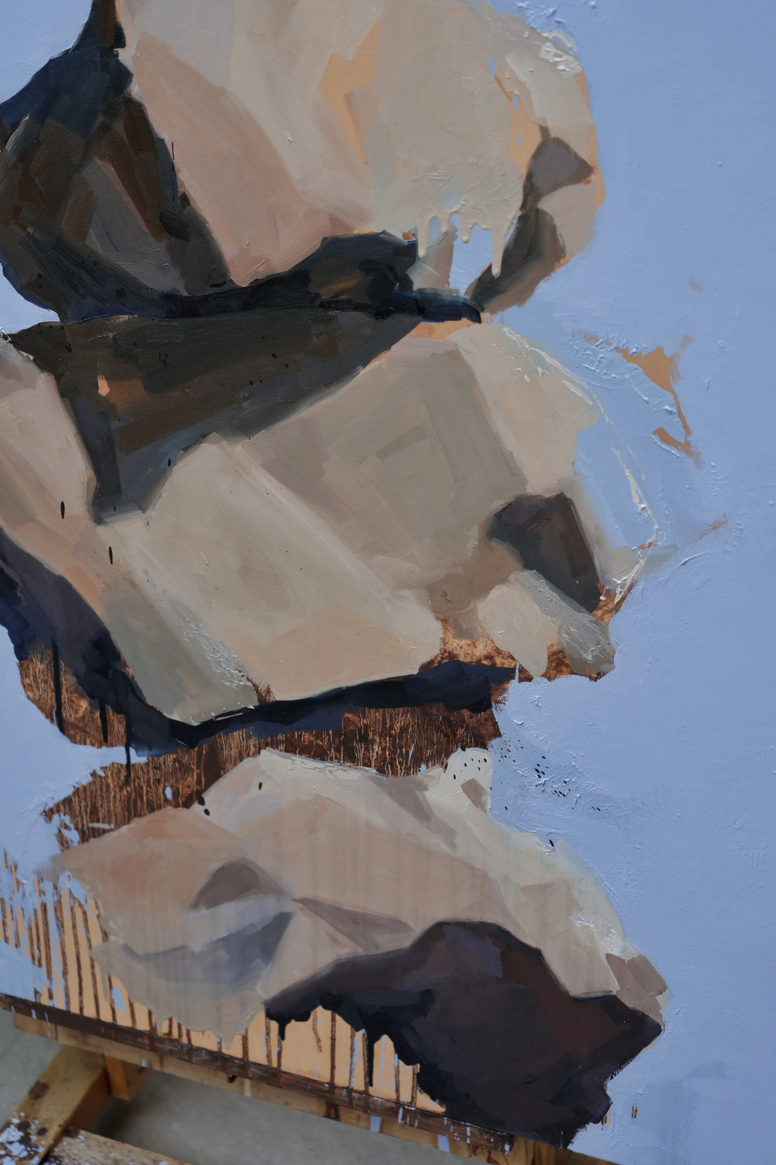 Cairn, detail – the stacked stones built from flat planes of grey, cream and ochre oil paint