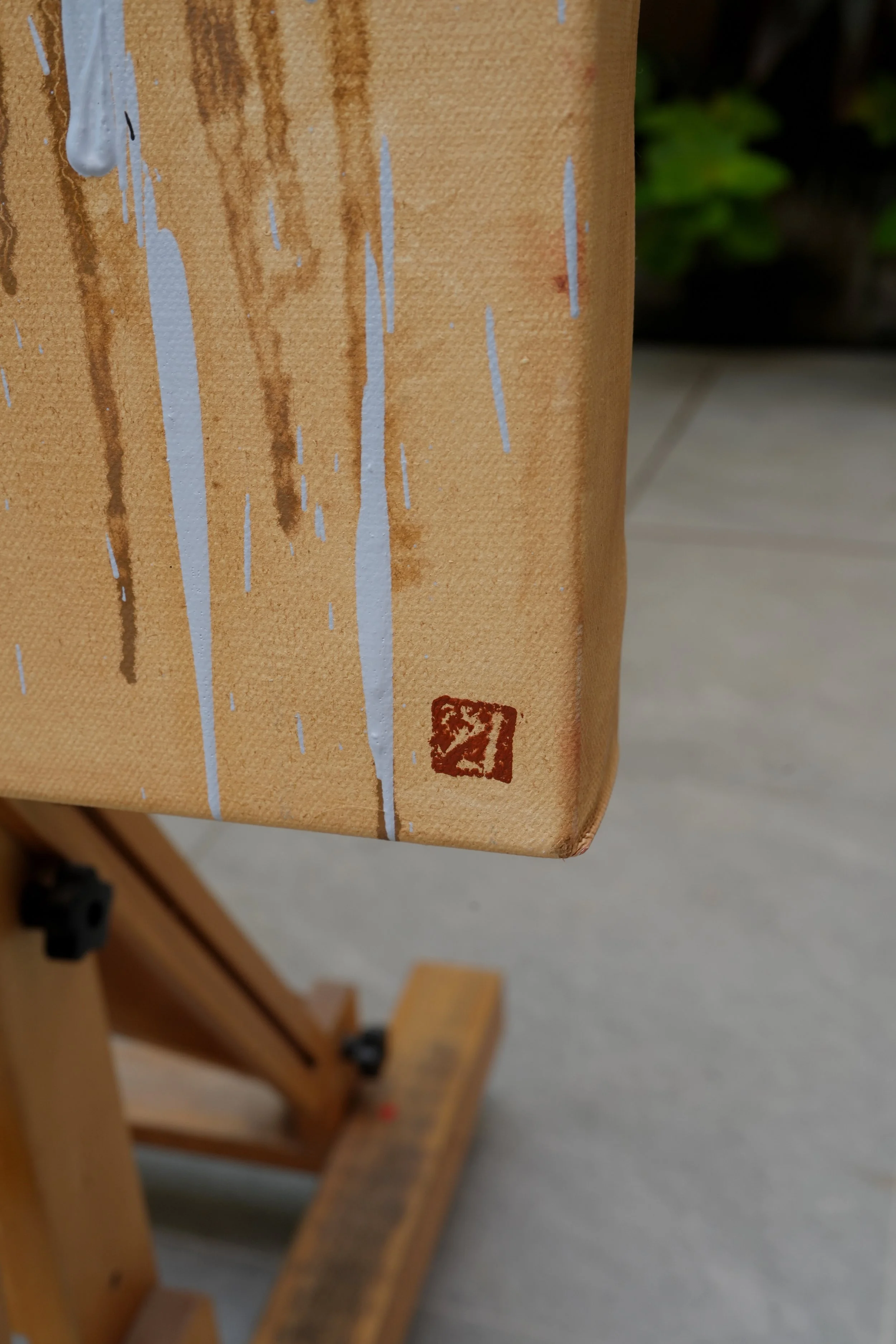 Painted edge of the canvas with ochre drips and the artist's red seal, from Given by Marina Ogai
