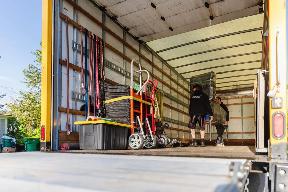 Inside the Butterfield truck with dollies, straps and moving blankets ready, move in Sherwood