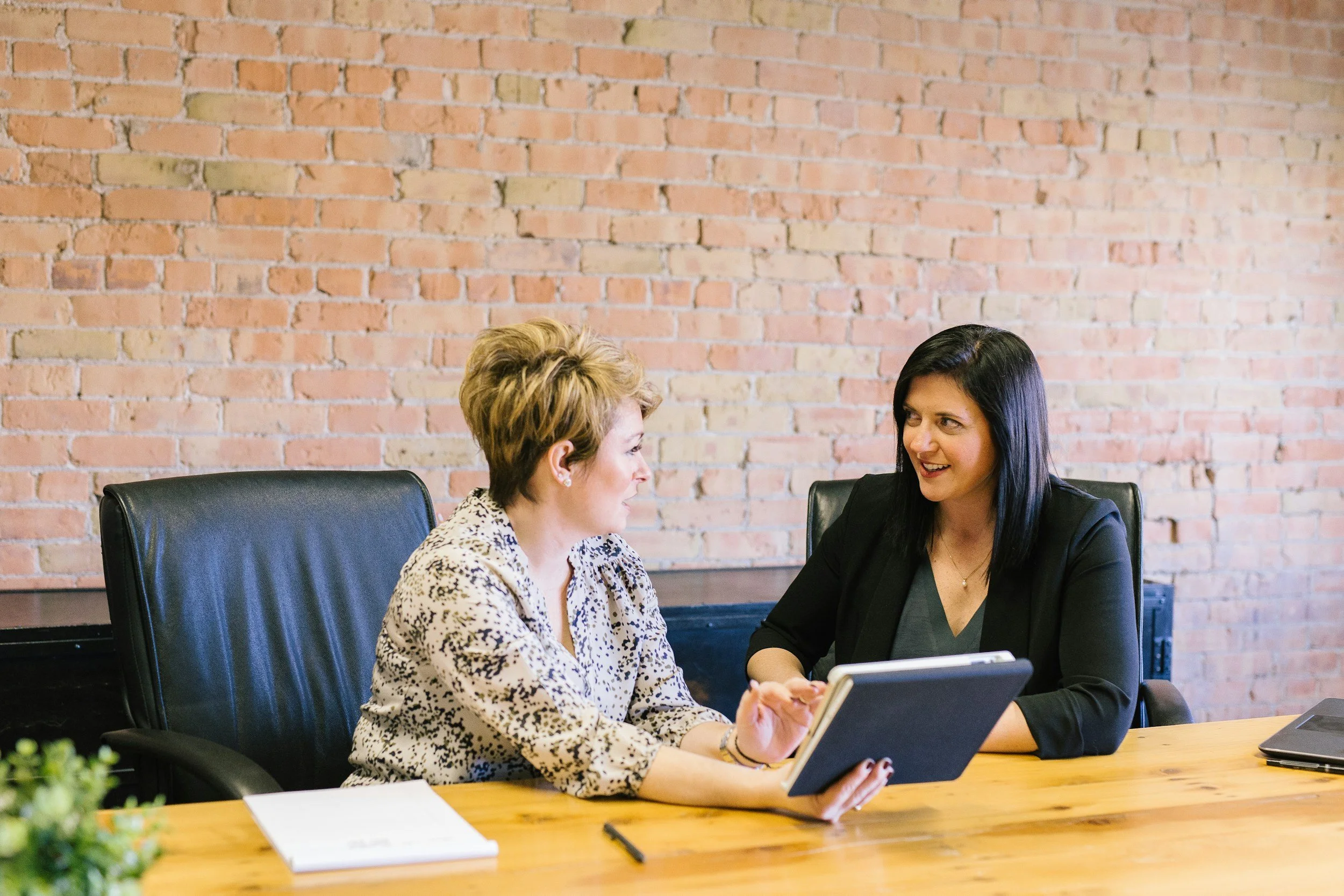 Commercial cleaning consultation at an office conference table