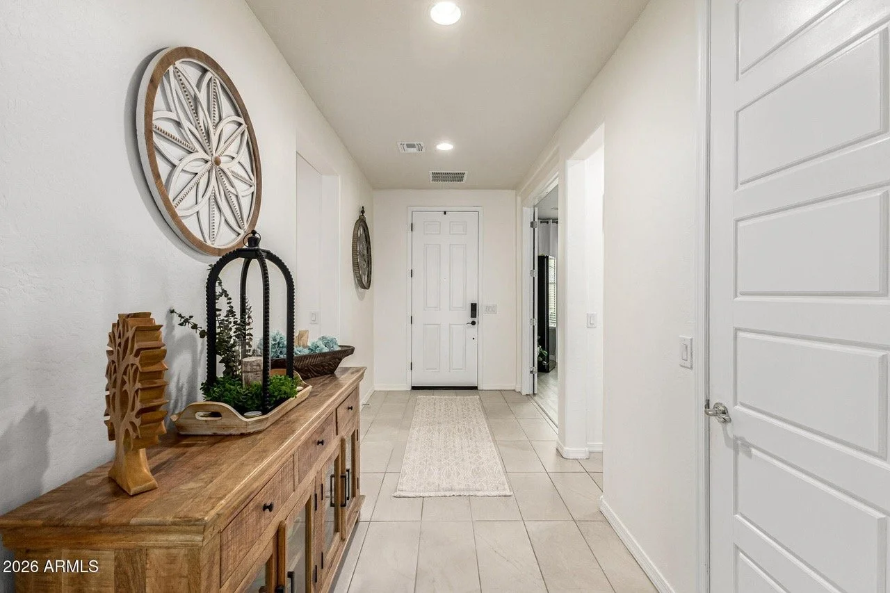 Clean, welcoming home entryway with clear floors and tidy surfaces