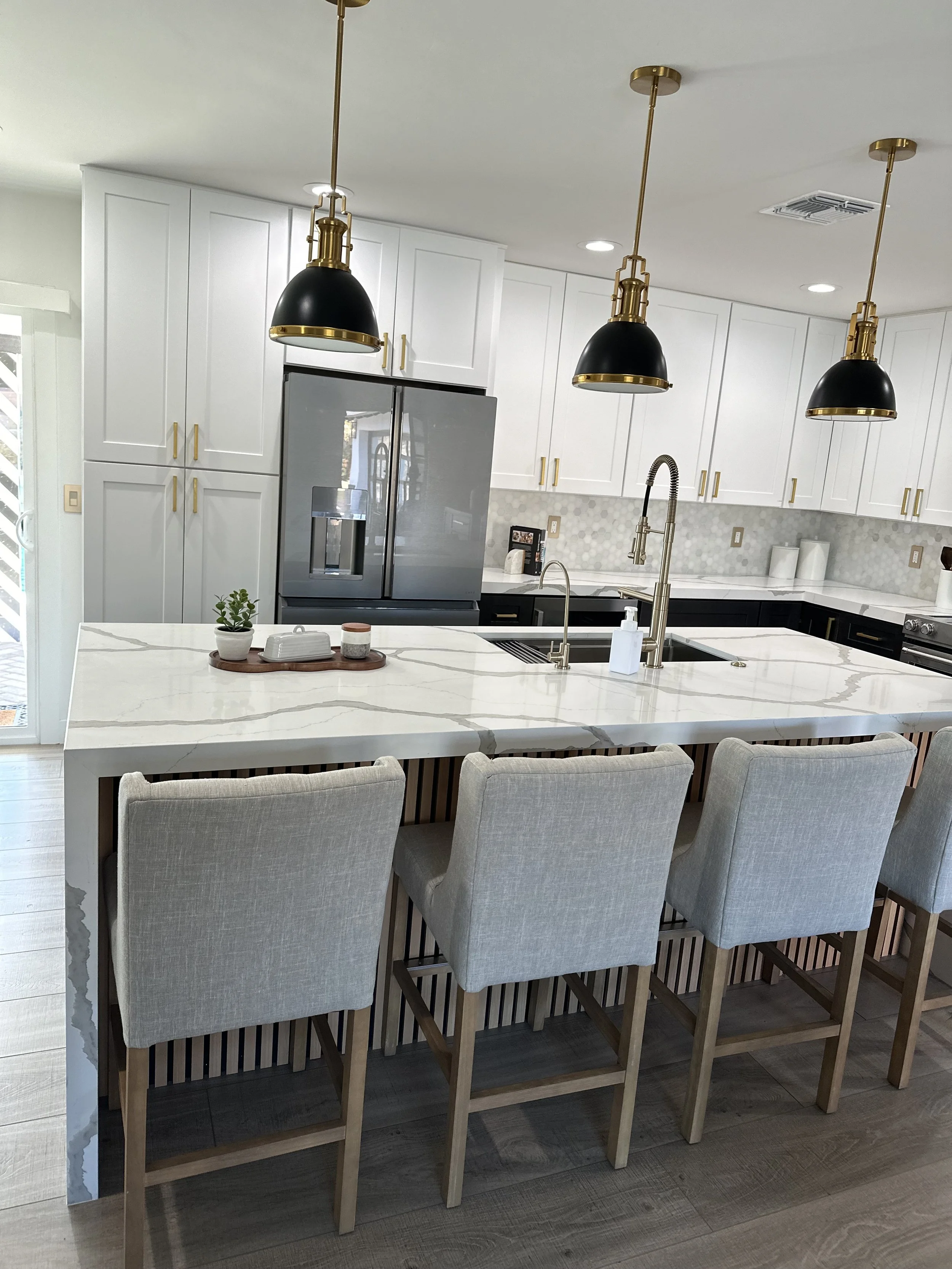 Guest-ready kitchen with polished island and organized seating