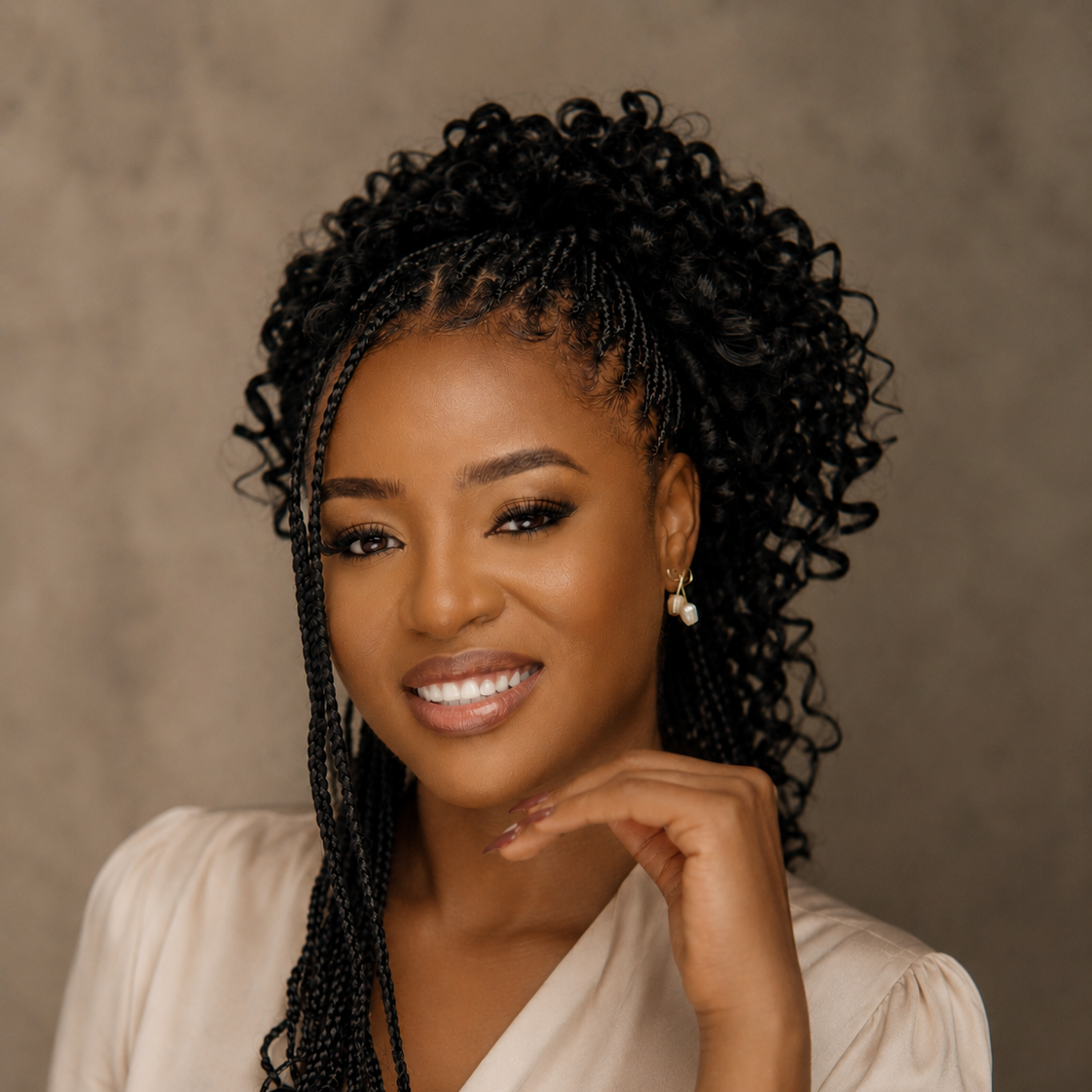Curly twists and protective styling at Iconique Hair Salon, Whitby, Ontario. Natural and textured hair care for women across Durham Region. Opening October 2026. Join the waitlist at iconiquehairsalon.com.