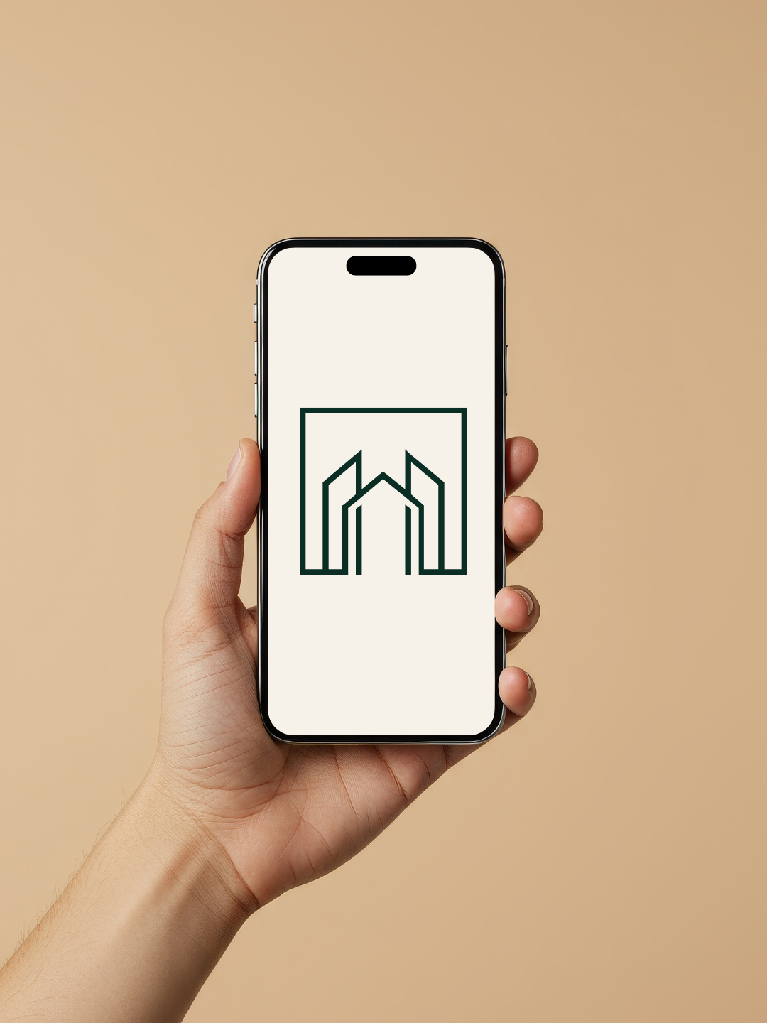A hand holding a smartphone displaying a minimalist black outline logo of a house or building on a white background.