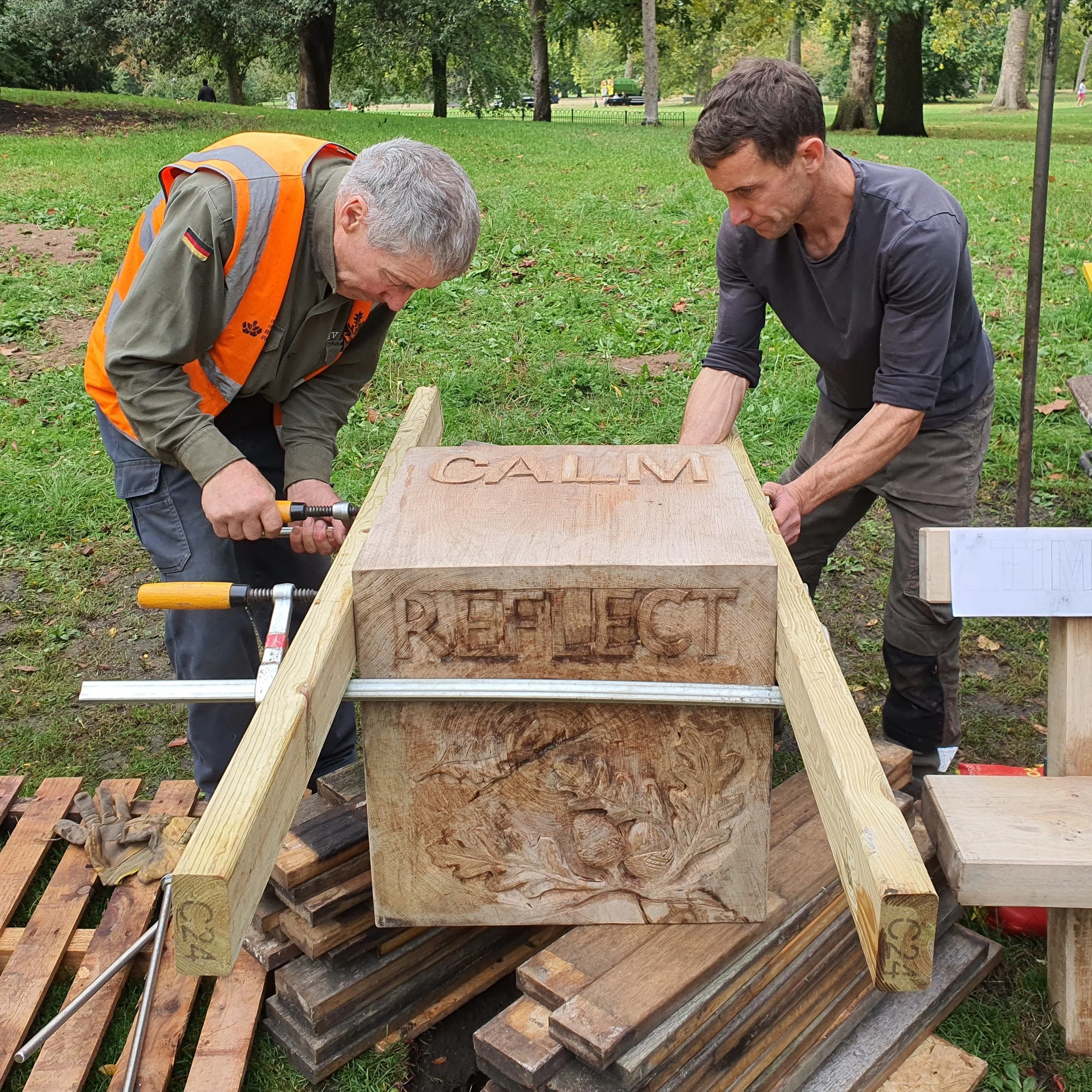Installing carved Oak cubes.jpg