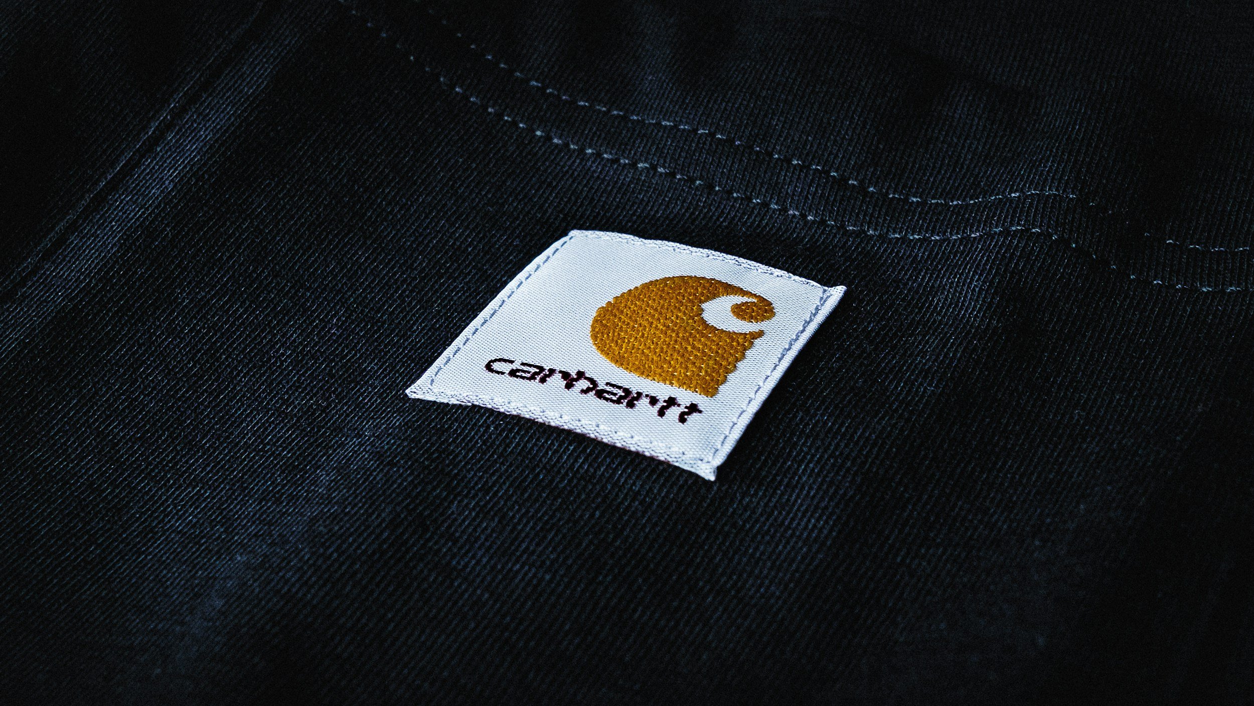 Commercial embroidery machine stitching company logos