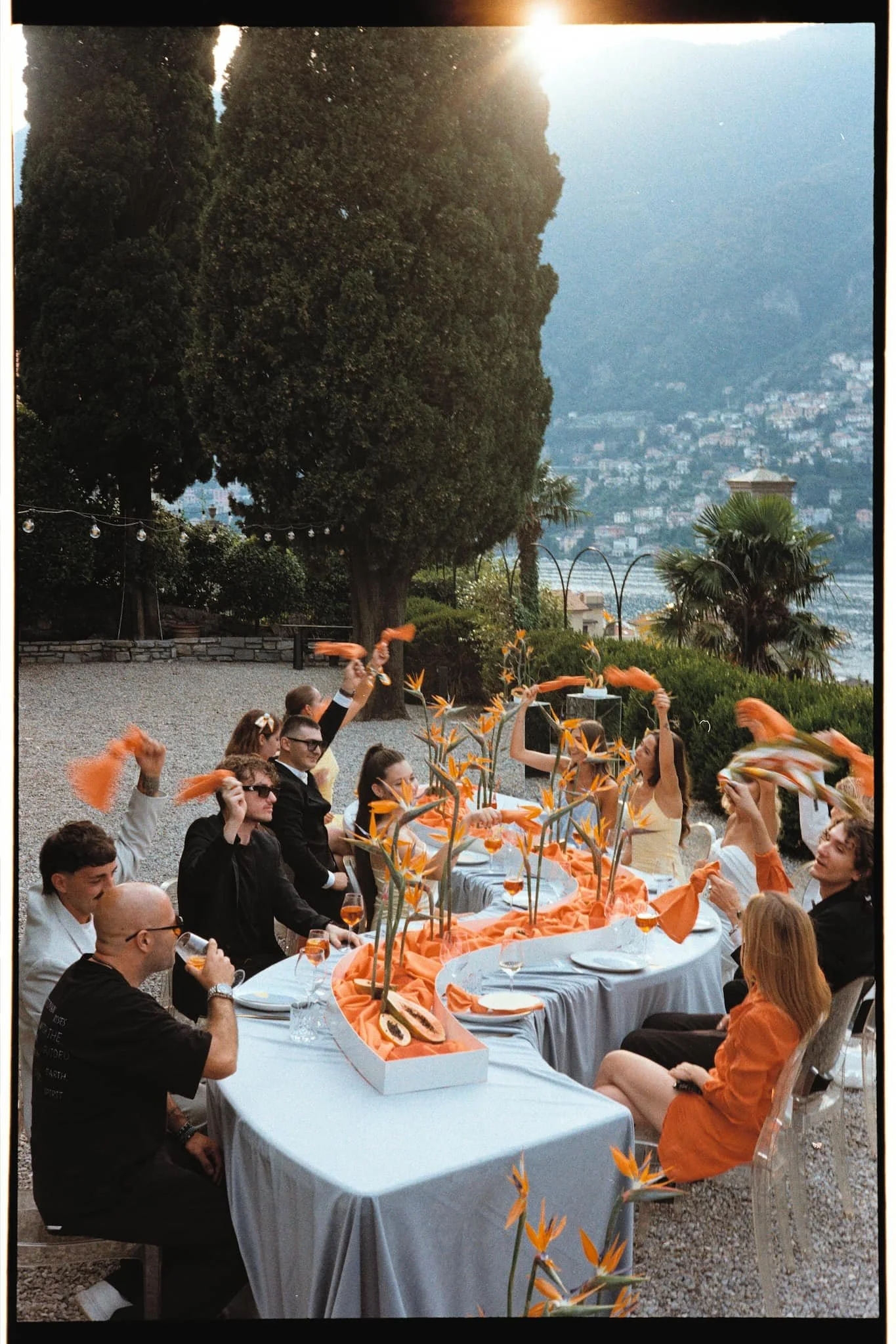 film photography lake como wedding celebration documentary style photo with the party