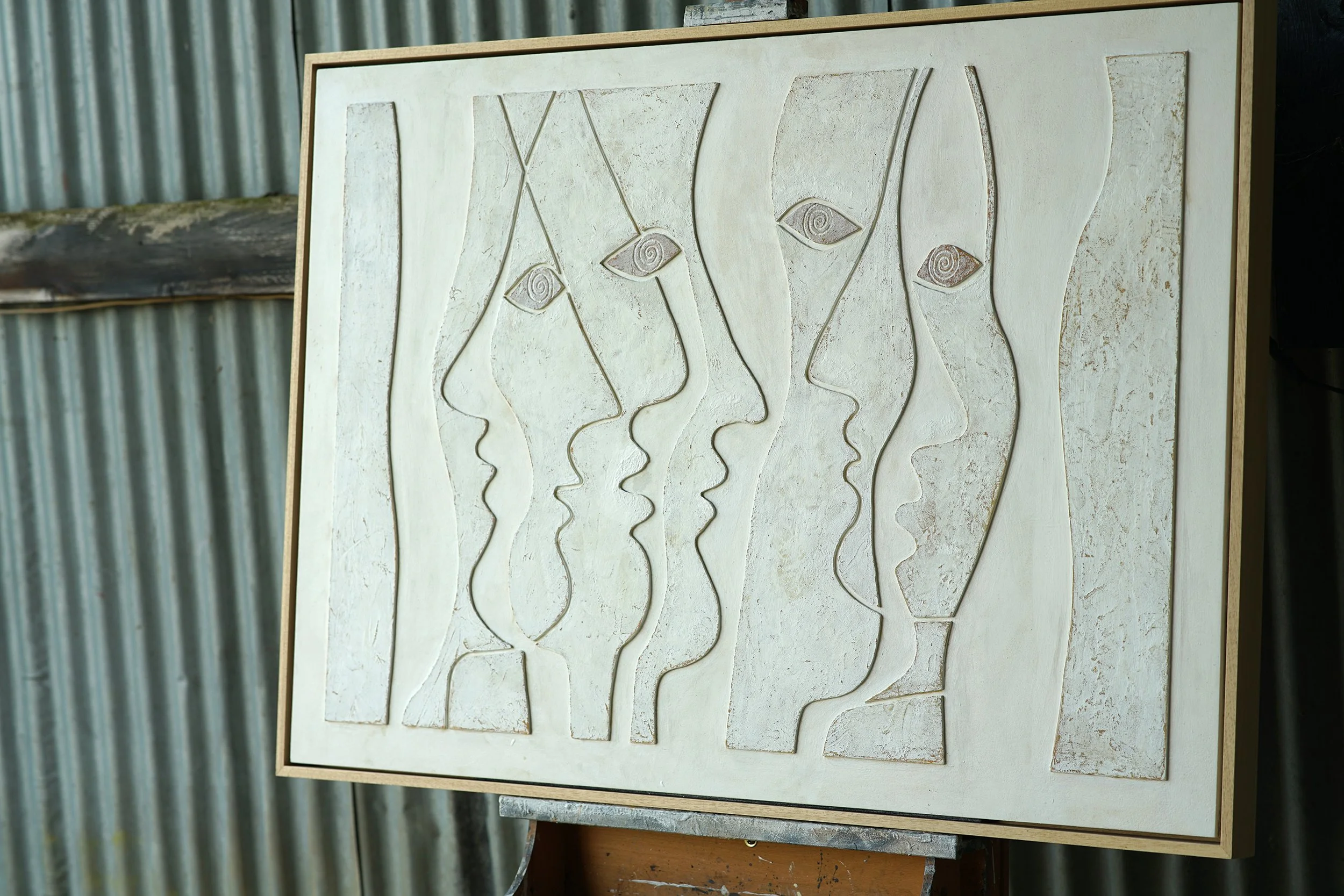 Faces White Right Small.jpg