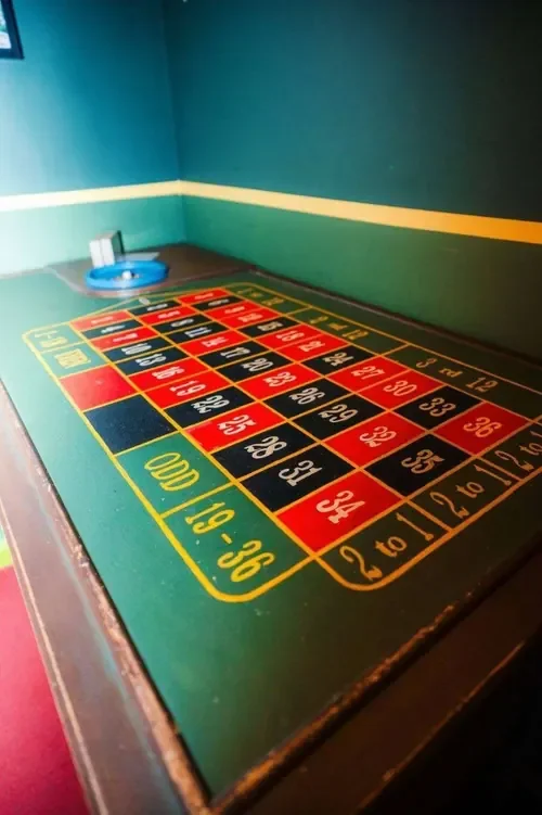 The hand-painted roulette table in Casino Heist — Escape London Whitechapel