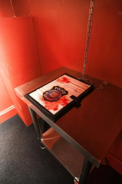 A blood-stained police case file in Taken II — Escape London Whitechapel