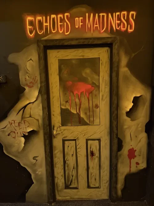 The bloodstained door to Mr. Hunt’s room in Echoes of Madness — Escape London Islington