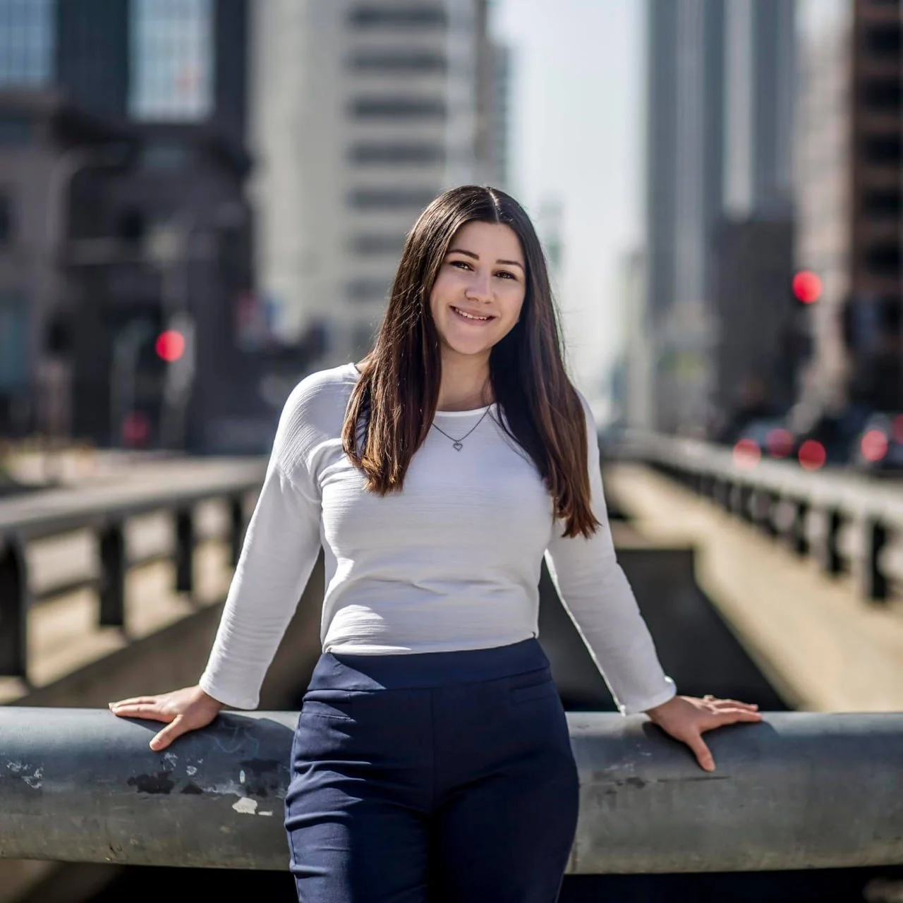 a tax professional posing for photos in downtown LA
