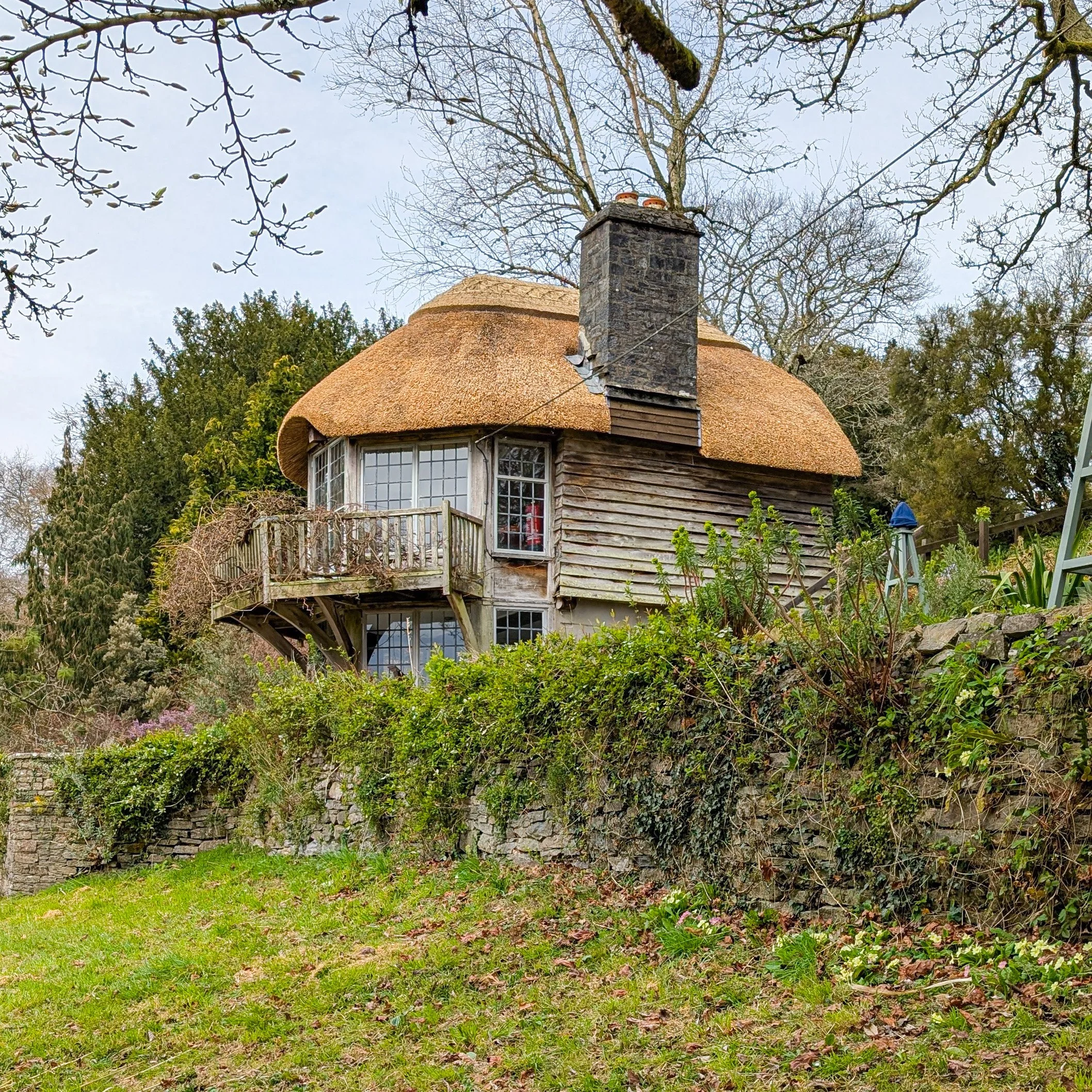 The old playhouse, Dartington Estate, Devon. Water reed coat and wheat block ridge.