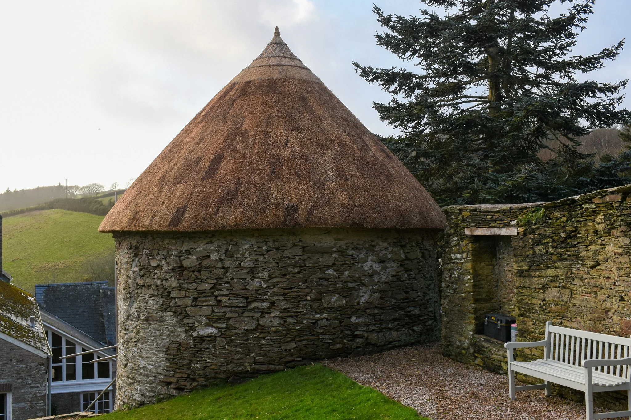 A dovecote on a private estate, South Devon. Water reed and wheat flush ridge.