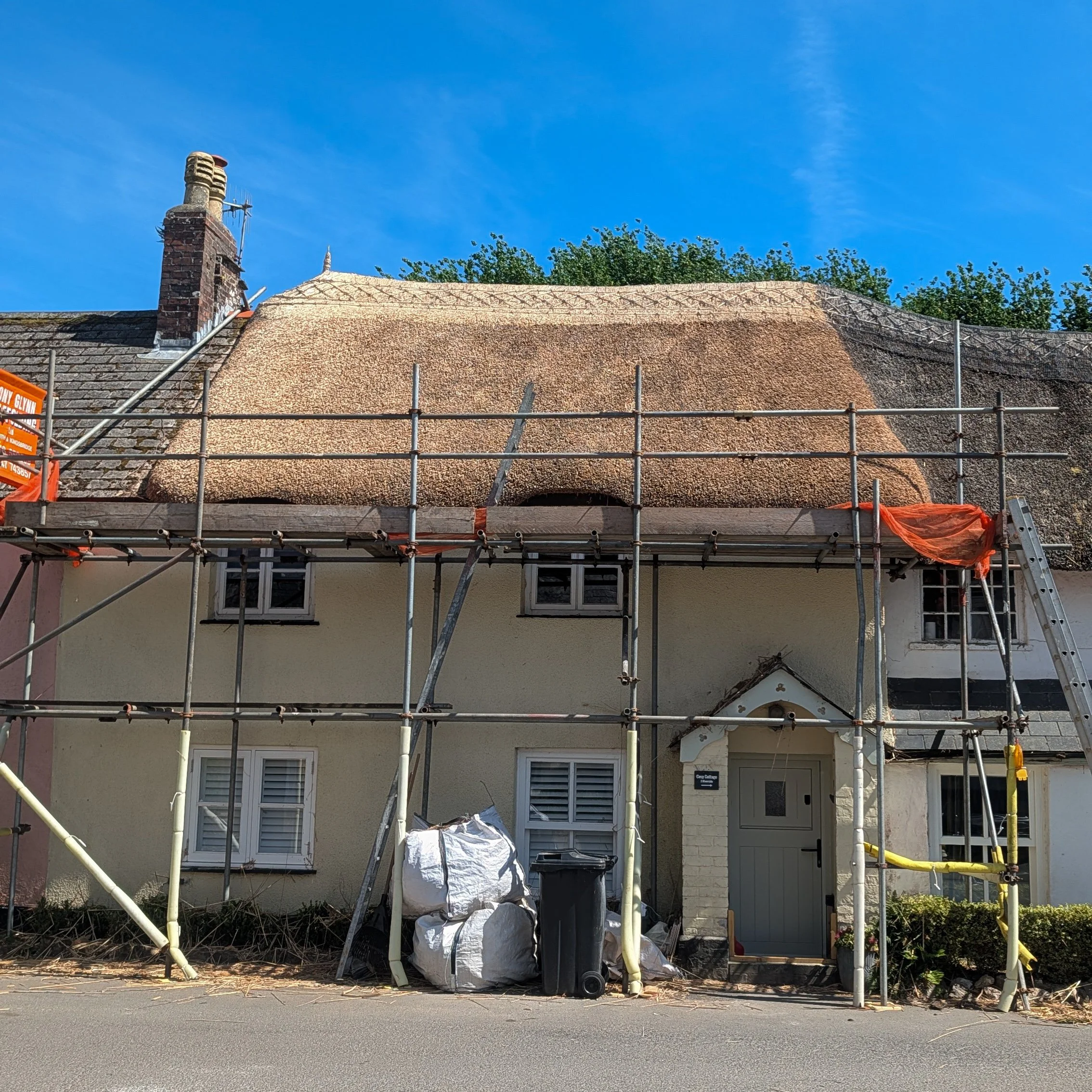 Cottage in South Pool, Devon. Water reed and wheat flush ridge.