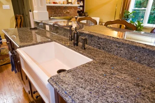 Kitchen countertop made from authentic blue-eyes labradorite from Labrador Canada. Mark Brace of Ocean Floor Granite in partnership with Atlantic Stoneworks. As seen on Dragon's Den.