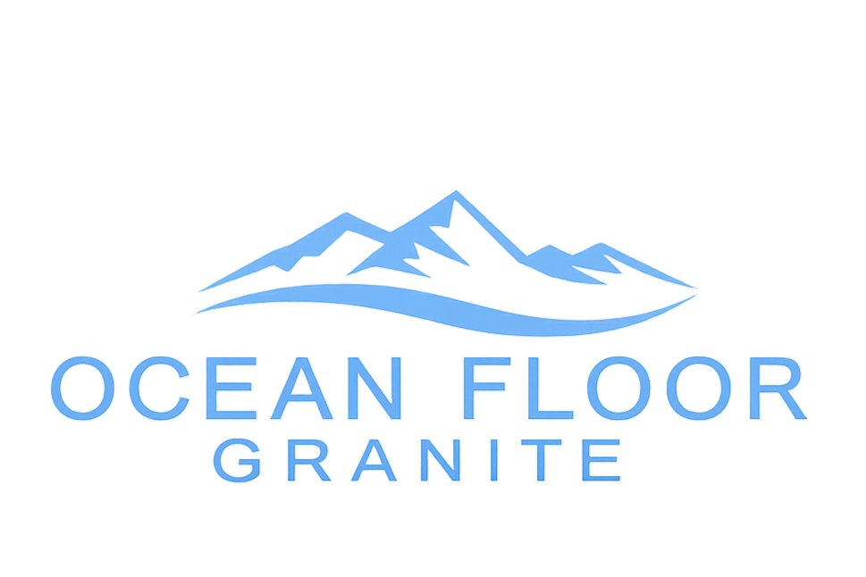 Logo with a mountain illustration and the text "OCEAN FLOOR GRANITE" in blue lettering.
