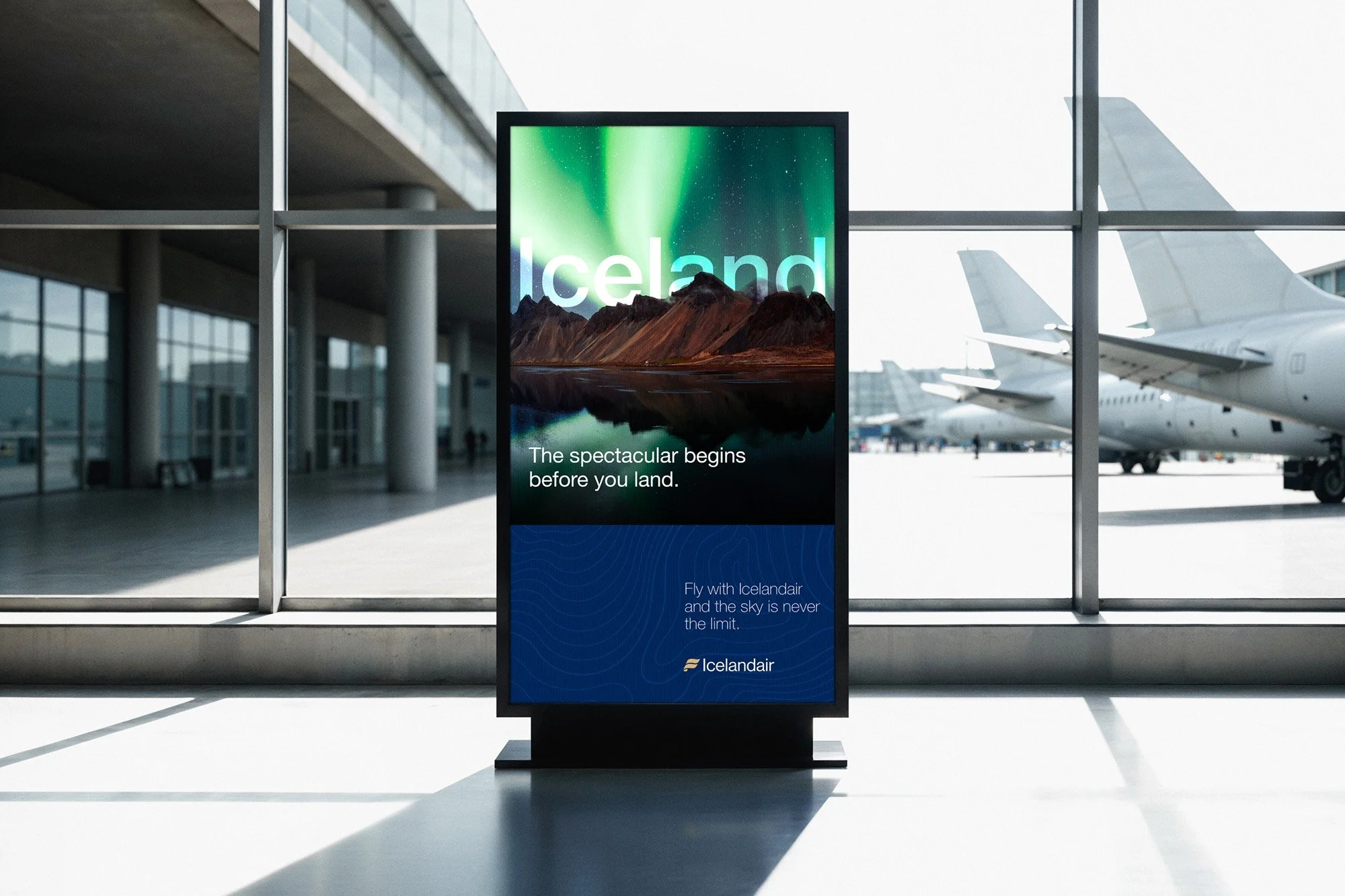 Airline brand messaging displayed on a billboard in an airport