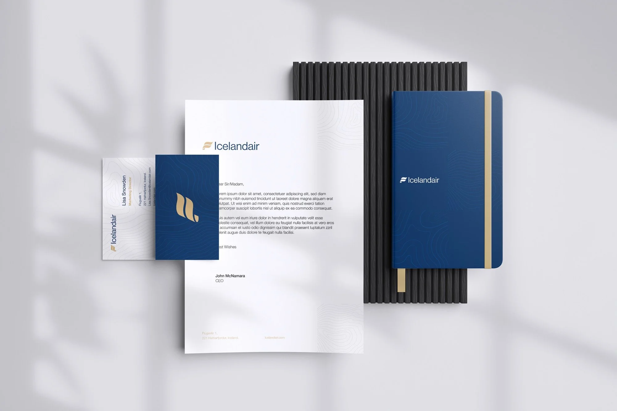 Airline branded stationery including business cards, letterhead and notebook