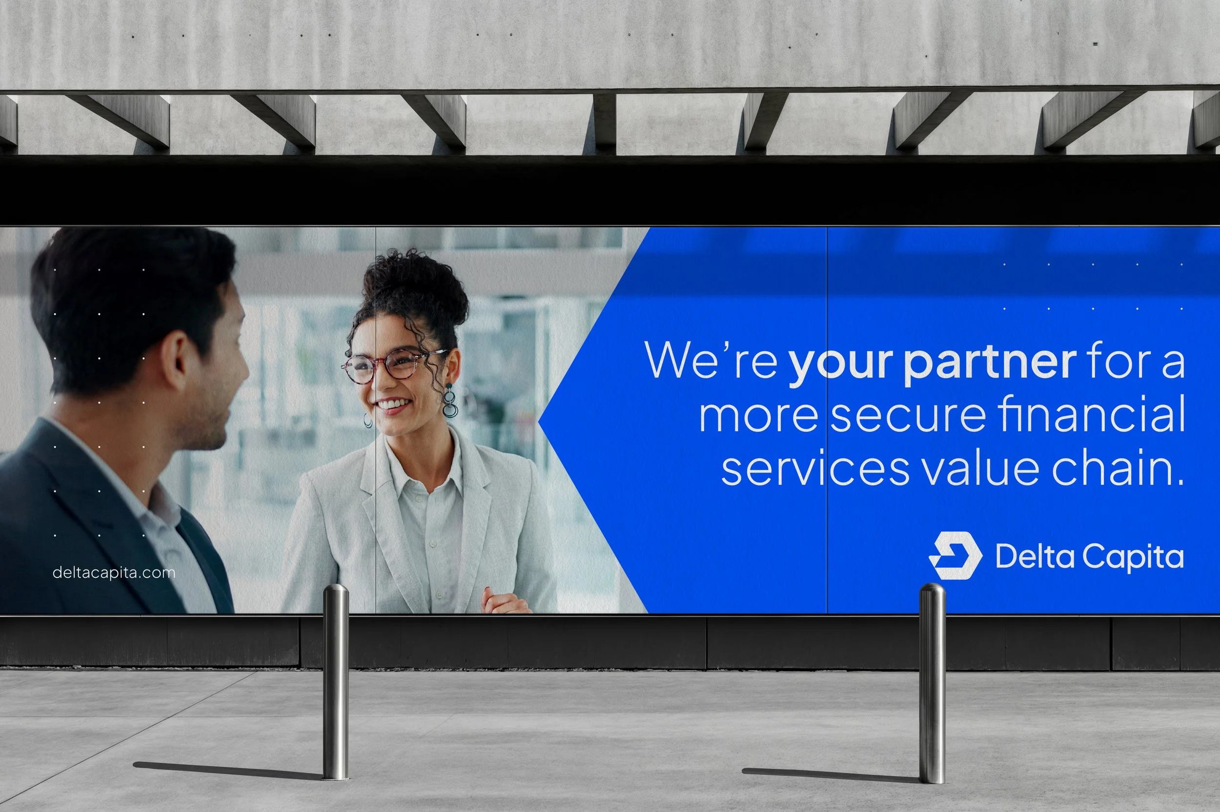 Financial services advertising displayed on a large billboard wall
