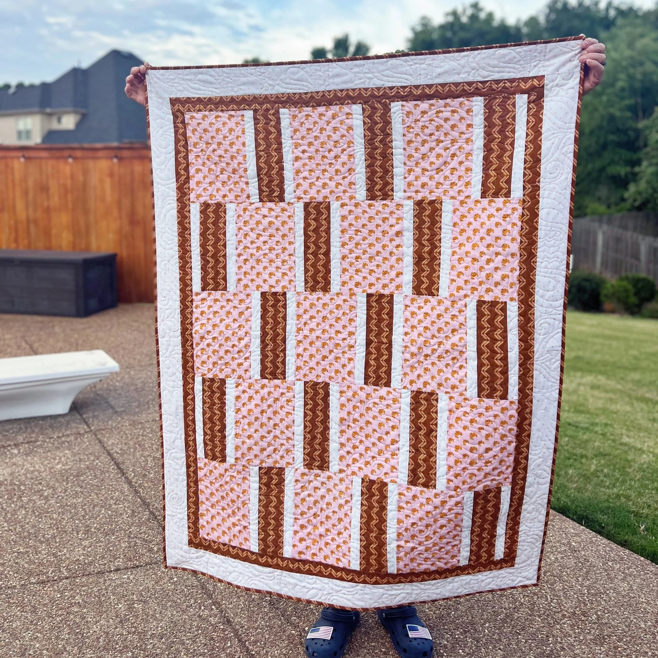 Croissant Crush, May 2026,
fabric: I Love Carbs, Camelot Fabrics,
pattern: Fabric Cafe, Three Yard Quilts