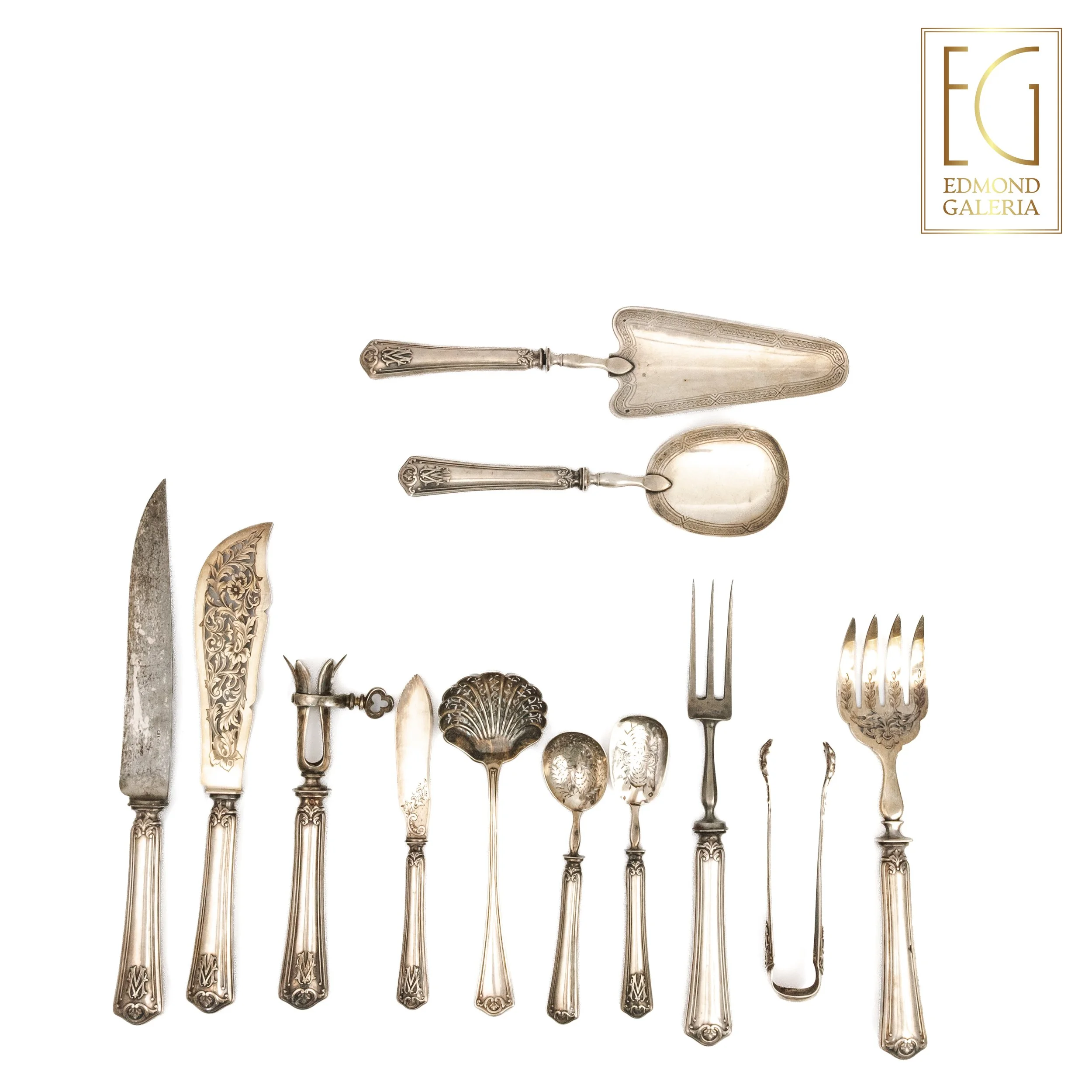 Set din argint, format din 12 tacâmuri pentru servit mâncare, decorat cu monogramă MV, atelier Chenailler Henri-Louis, Paris, cca. 1850