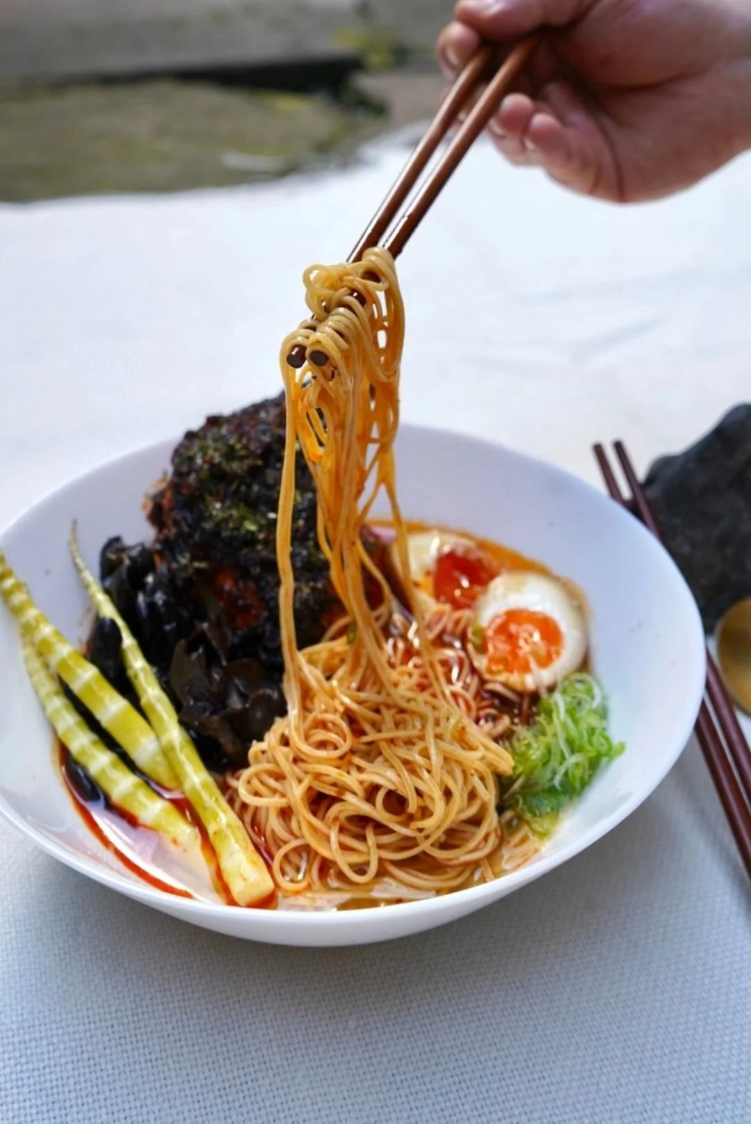 Corporate catering as a bowl of chicken with noodles, sauce, egg and vegetables — Kilted Chicken by Chef Rodney Wages